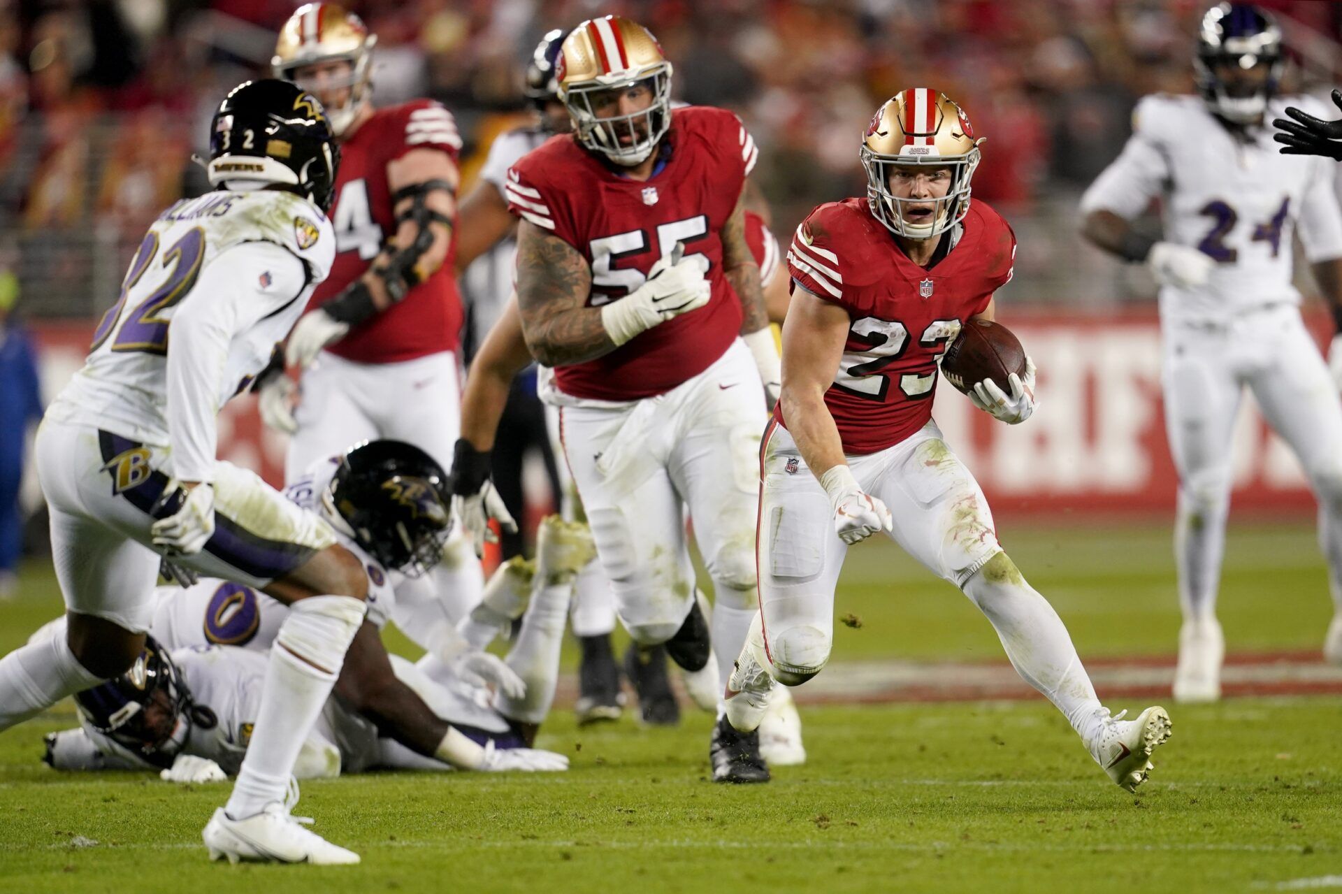 San Francisco 49ers running back Christian McCaffrey (23) runs the ball against the Baltimore Ravens in the third quarter at Levi's Stadium.