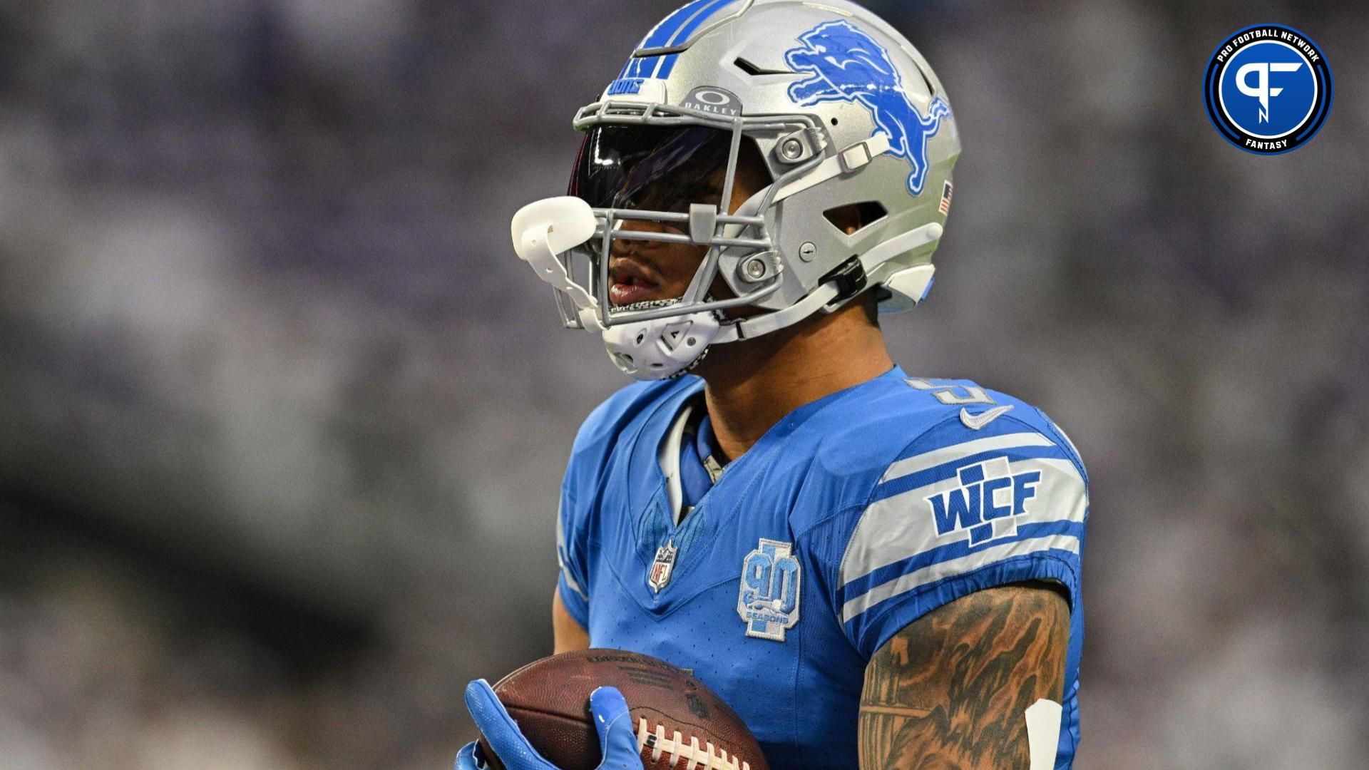 Detroit Lions running back David Montgomery (5) warms up before the game against the Minnesota Vikings at U.S. Bank Stadium.