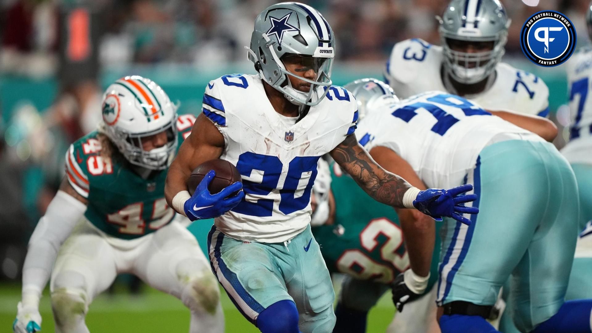 Dallas Cowboys running back Tony Pollard (20) runs the ball against the Miami Dolphins during the second half at Hard Rock Stadium.