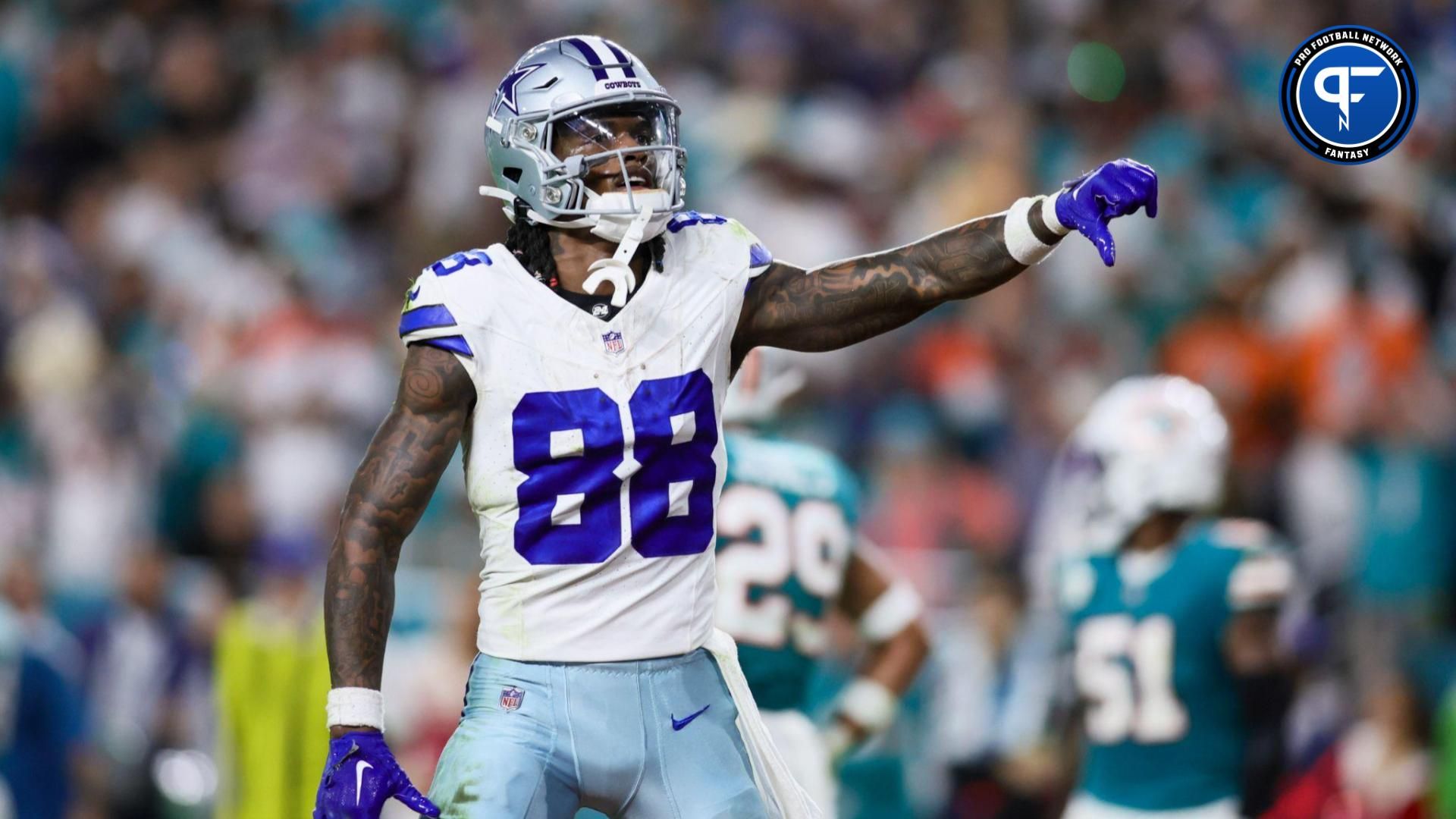 Dallas Cowboys wide receiver CeeDee Lamb (88) reacts toward Miami Dolphins fans during the fourth quarter at Hard Rock Stadium.