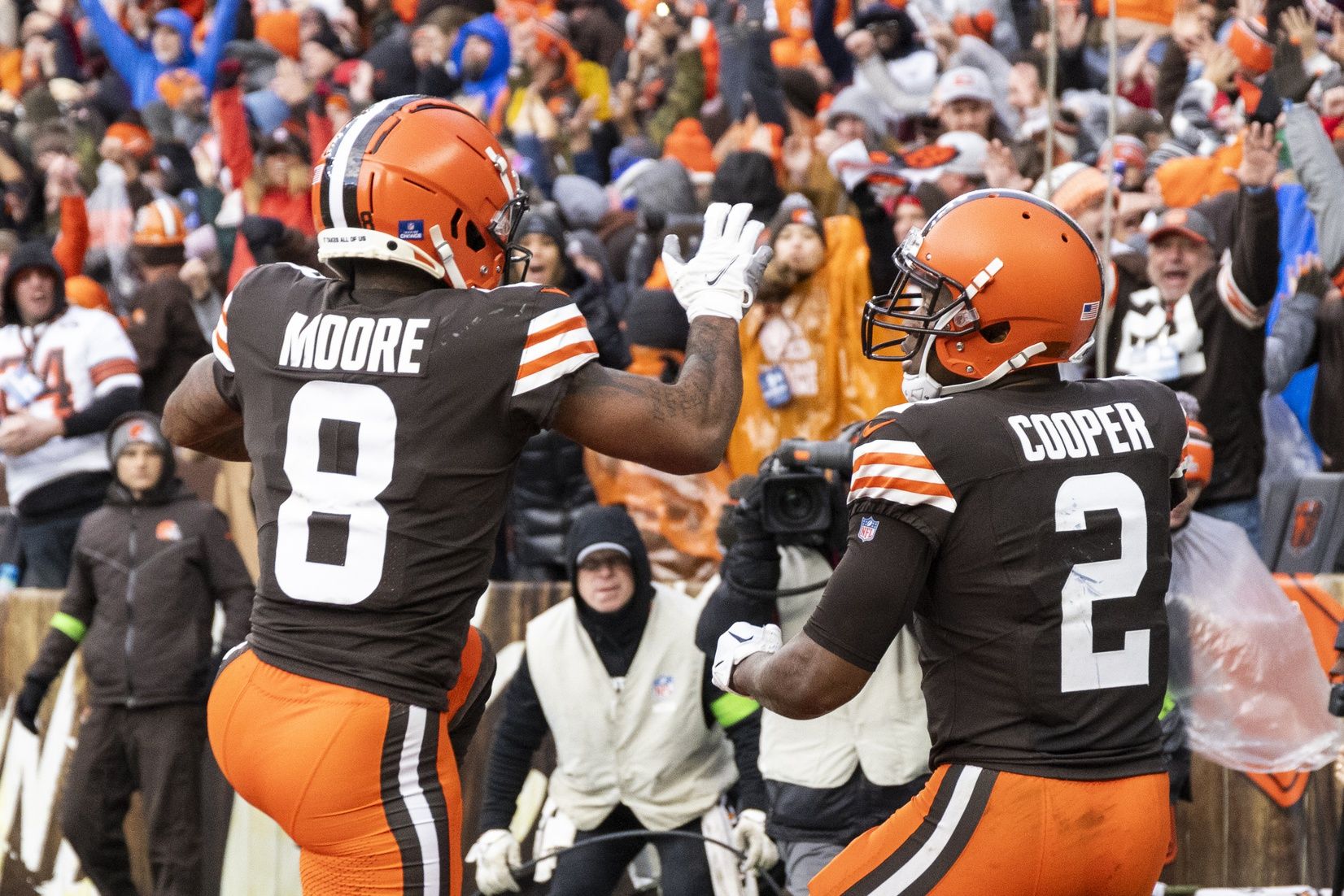 Cleveland Browns wide receiver Amari Cooper (2) celebrates his touchdown run with wide receiver Elijah Moore (8).