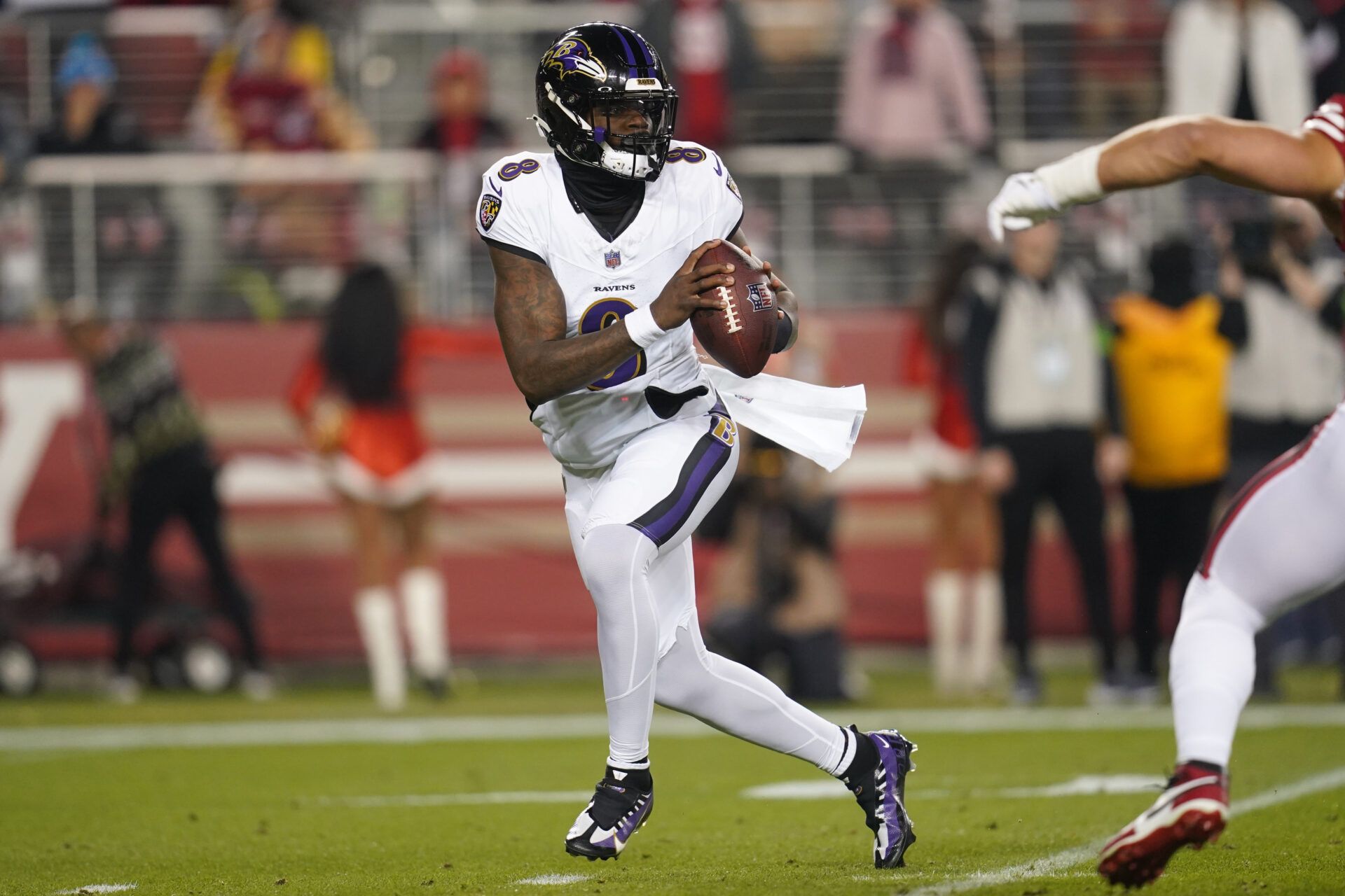 Baltimore Ravens quarterback Lamar Jackson (8) looks to throw a pass against the San Francisco 49ers in the first quarter at Levi's Stadium.