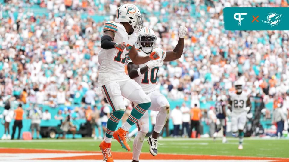 Miami Dolphins wide receiver Jaylen Waddle (17) celebrates his touchdown against the New England Patriots with wide receiver Tyreek Hill (10) during the second half at Hard Rock Stadium.