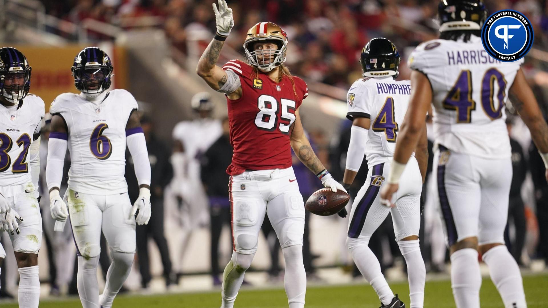 San Francisco 49ers tight end George Kittle (85) reacts after making a catch for a first down against the Baltimore Ravens in the first quarter at Levi's Stadium.