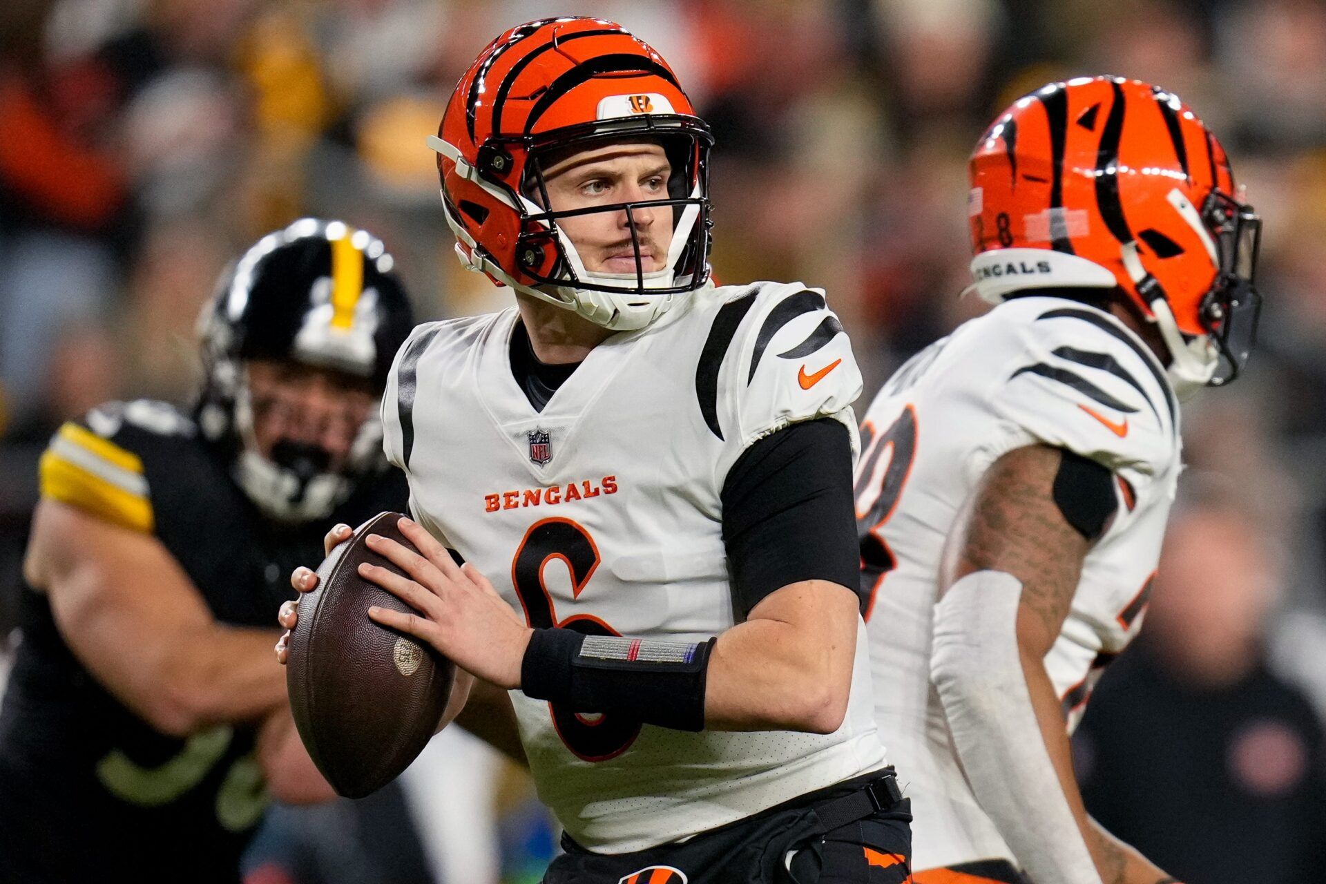 Cincinnati Bengals quarterback Jake Browning (6) stands back to throw a pass in the second quarter of the NFL 16 game between the Pittsburgh Steelers and the Cincinnati Bengals at Acrisure Stadium in Pittsburgh on Saturday, Dec. 23, 2023.