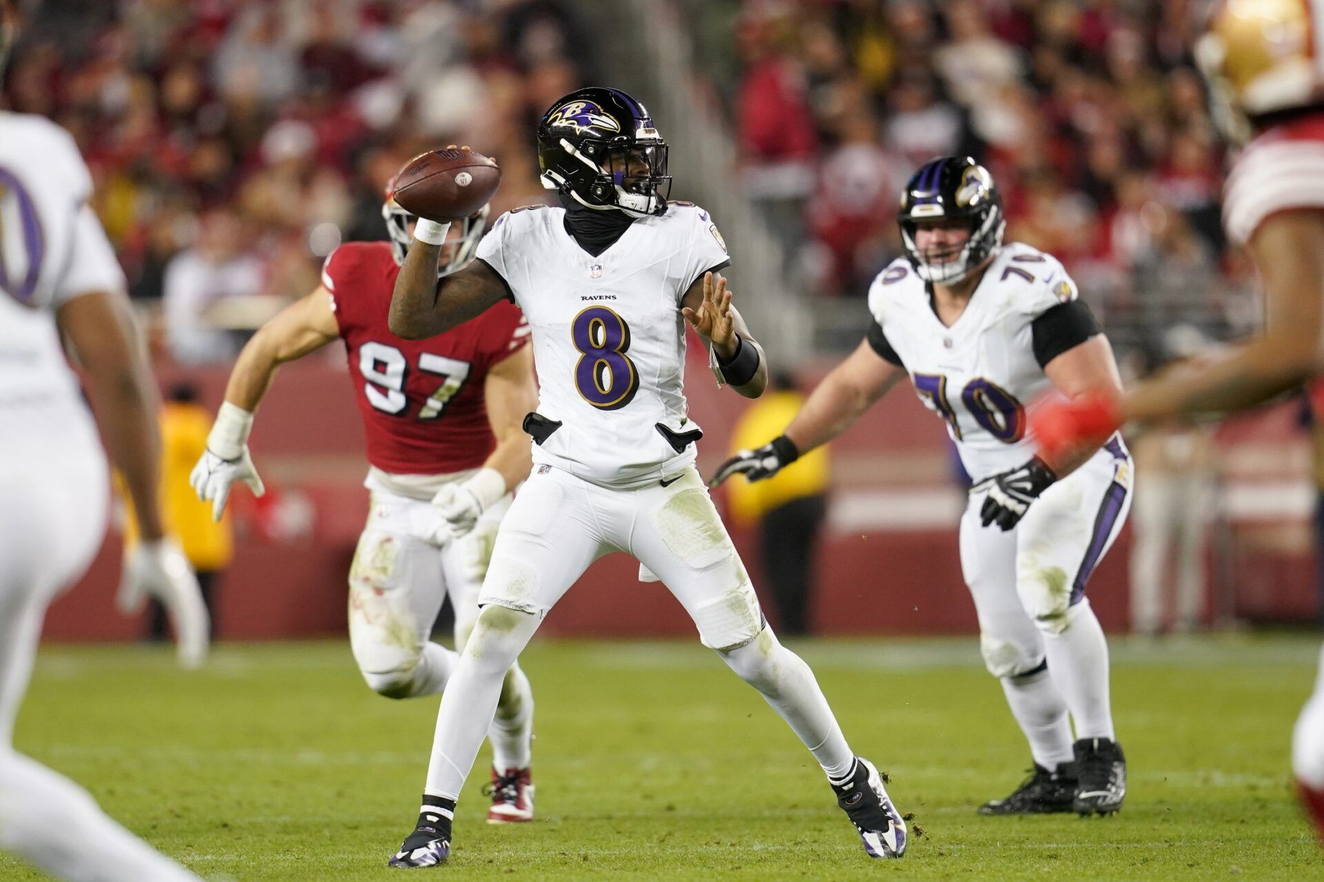 Baltimore Ravens quarterback Lamar Jackson (8) throws a pass against the San Francisco 49ers in the third quarter at Levi's Stadium.