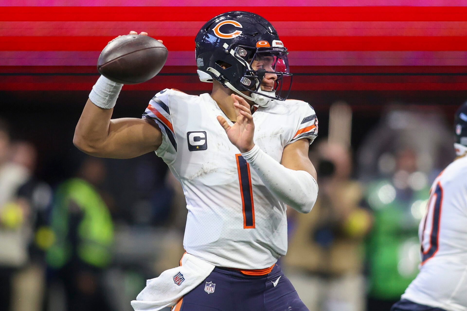 Chicago Bears quarterback Justin Fields (1) throws a pass against the Atlanta Falcons in the second half at Mercedes-Benz Stadium.