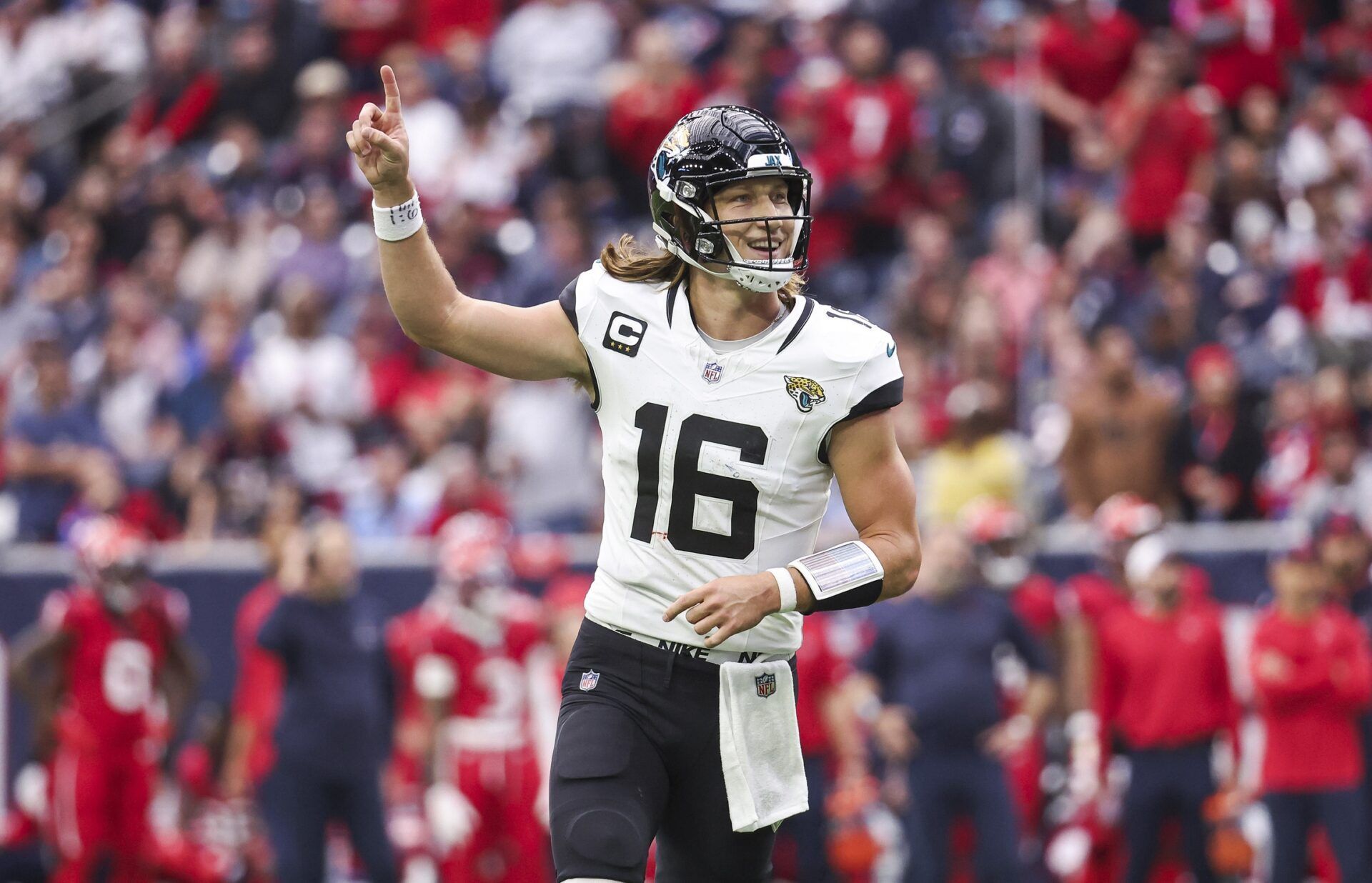 Jacksonville Jaguars quarterback Trevor Lawrence (16) reacts after a two-point conversion during the third quarter against the Houston Texans at NRG Stadium.