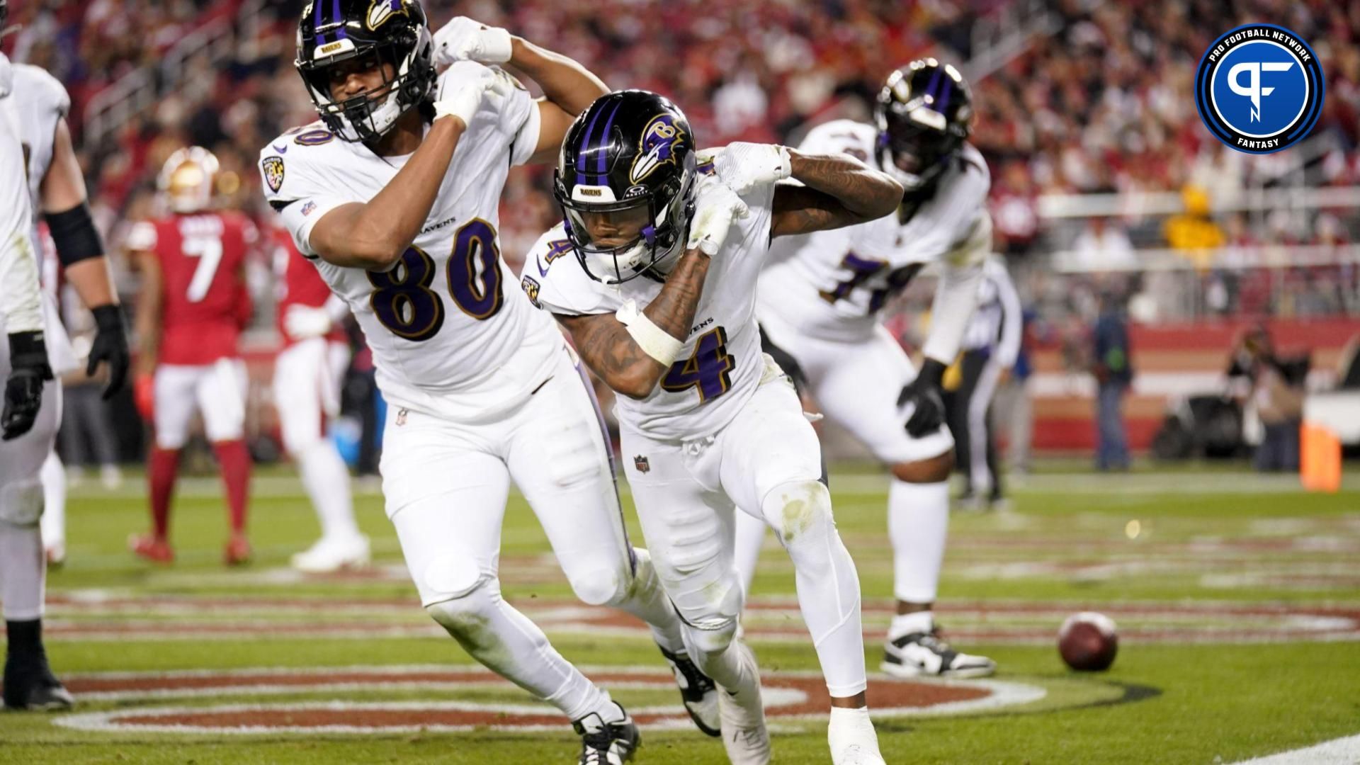 Baltimore Ravens wide receiver Zay Flowers (4) celebrates with tight end Isaiah Likely (80) after catching a touchdown against the San Francisco 49ers in the third quarter at Levi's Stadium.