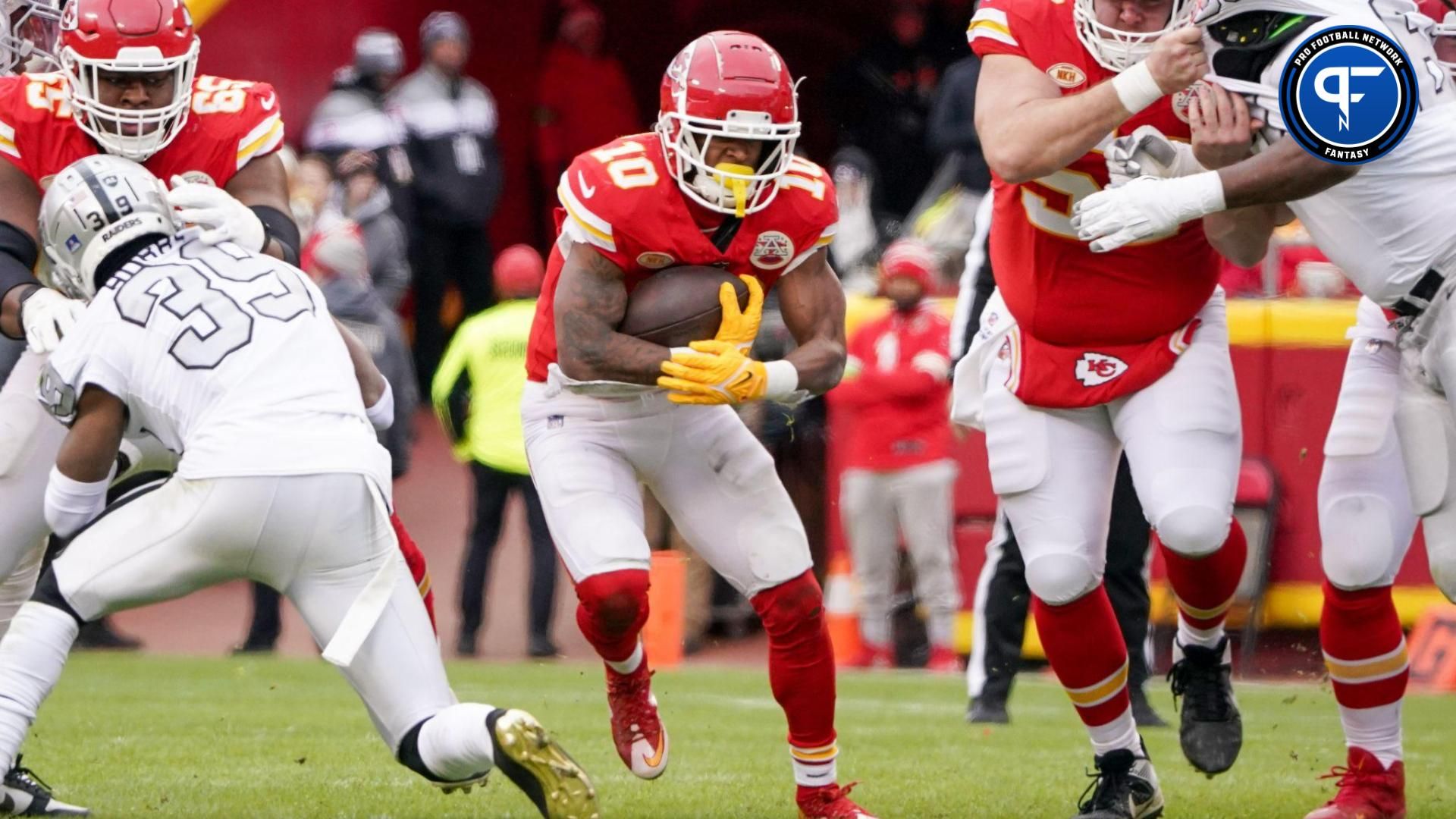 Kansas City Chiefs running back Isiah Pacheco (10) runs the ball against the Las Vegas Raiders during the first half at GEHA Field at Arrowhead Stadium.