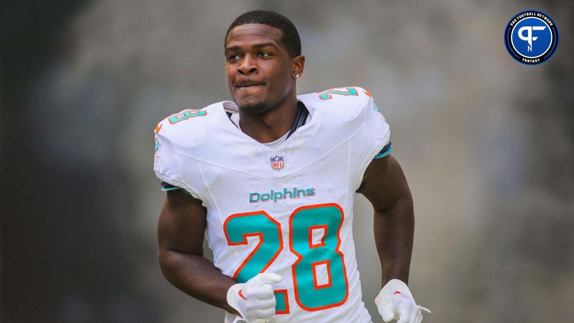 Miami Dolphins running back De'Von Achane (28) enters the field to take on the New York Jets at Hard Rock Stadium.