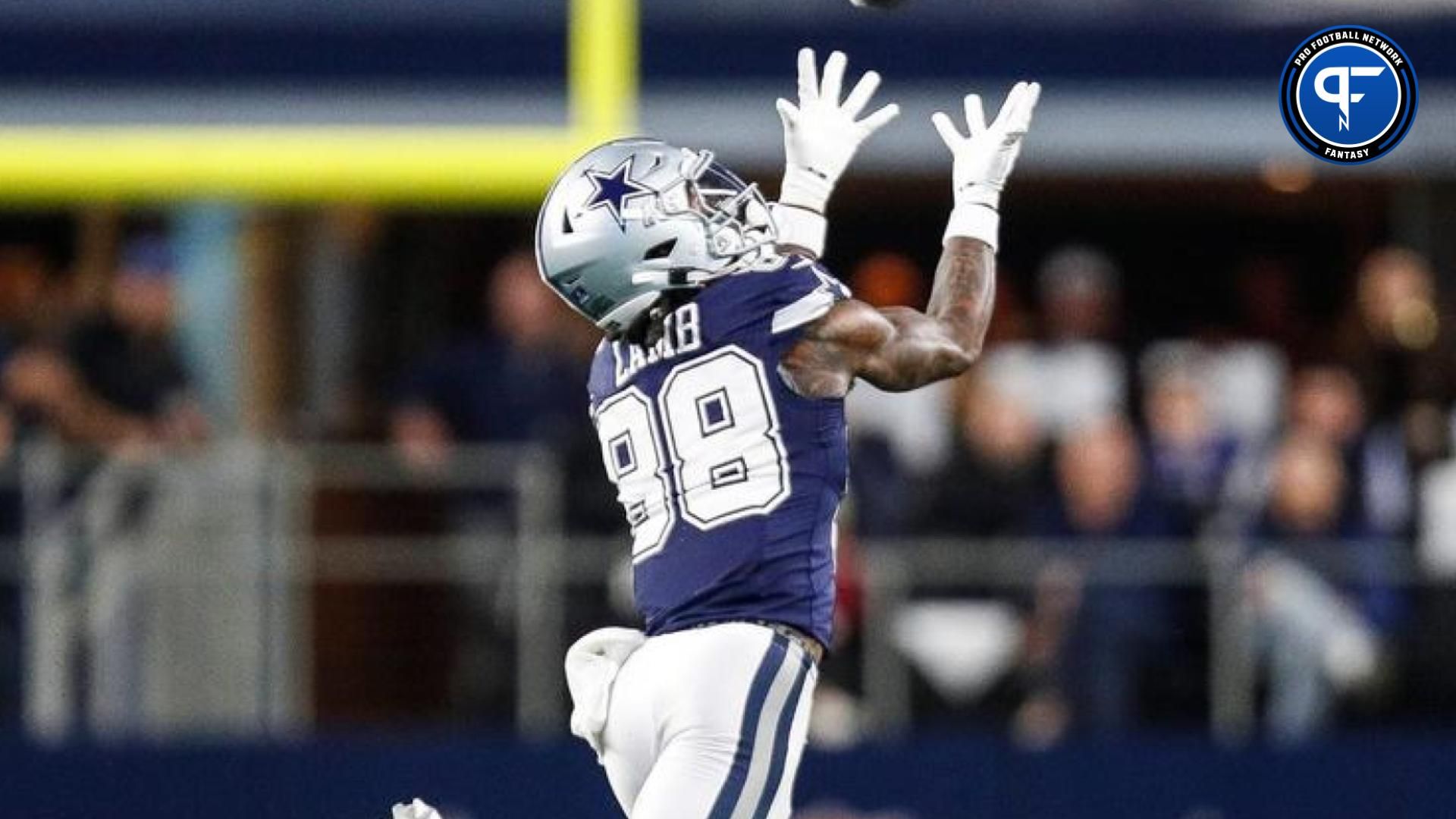 CeeDee Lamb makes a catch against Lions cornerback Kindle Vildor during the first half at AT&T Stadium.