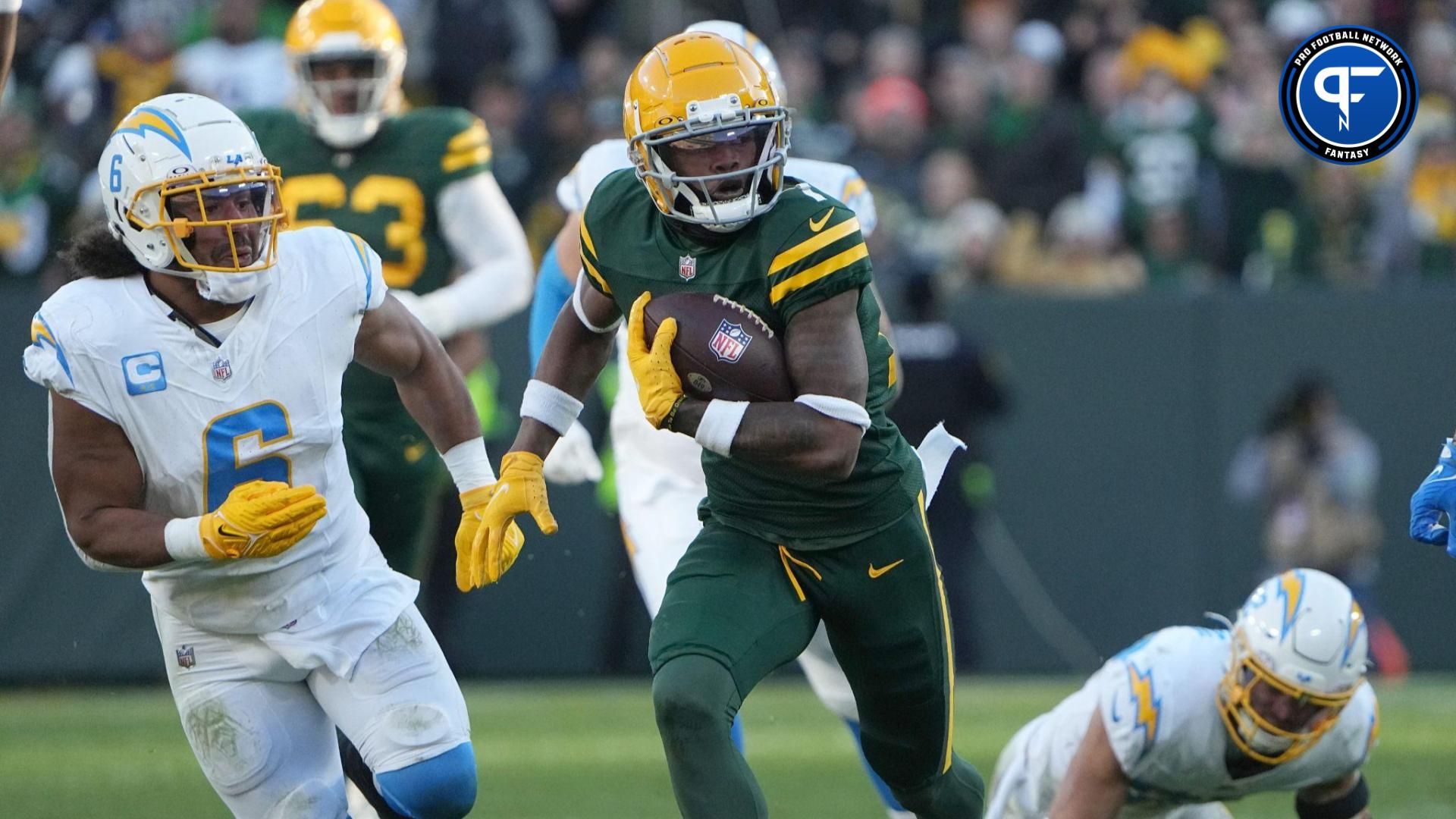 Green Bay Packers wide receiver Dontayvion Wicks (13) makes a 35-yard reception during the fourth quarter of their game Sunday, November 19, 2023 at Lambeau Field in Green Bay, Wisconsin. The Green Bay Packers beat the Los Angeles Chargers 23-20.