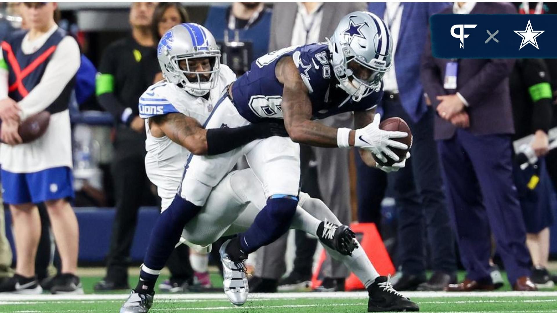 Dallas Cowboys WR CeeDee Lamb (88) stretches out for more yardage after a catch against the Detroit Lions.