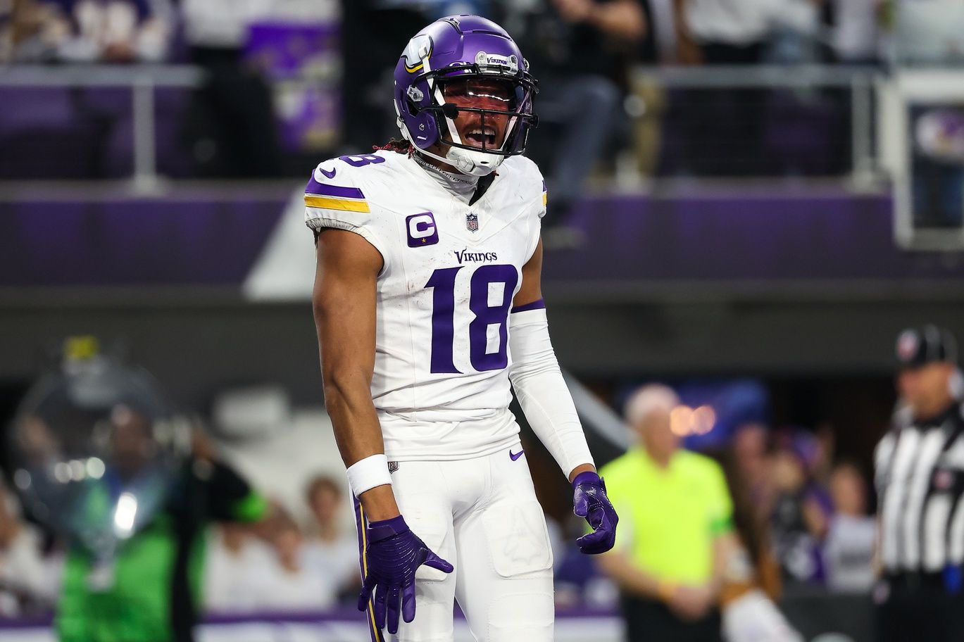 Minnesota Vikings WR Justin Jefferson (18) celebrates a touchdown.