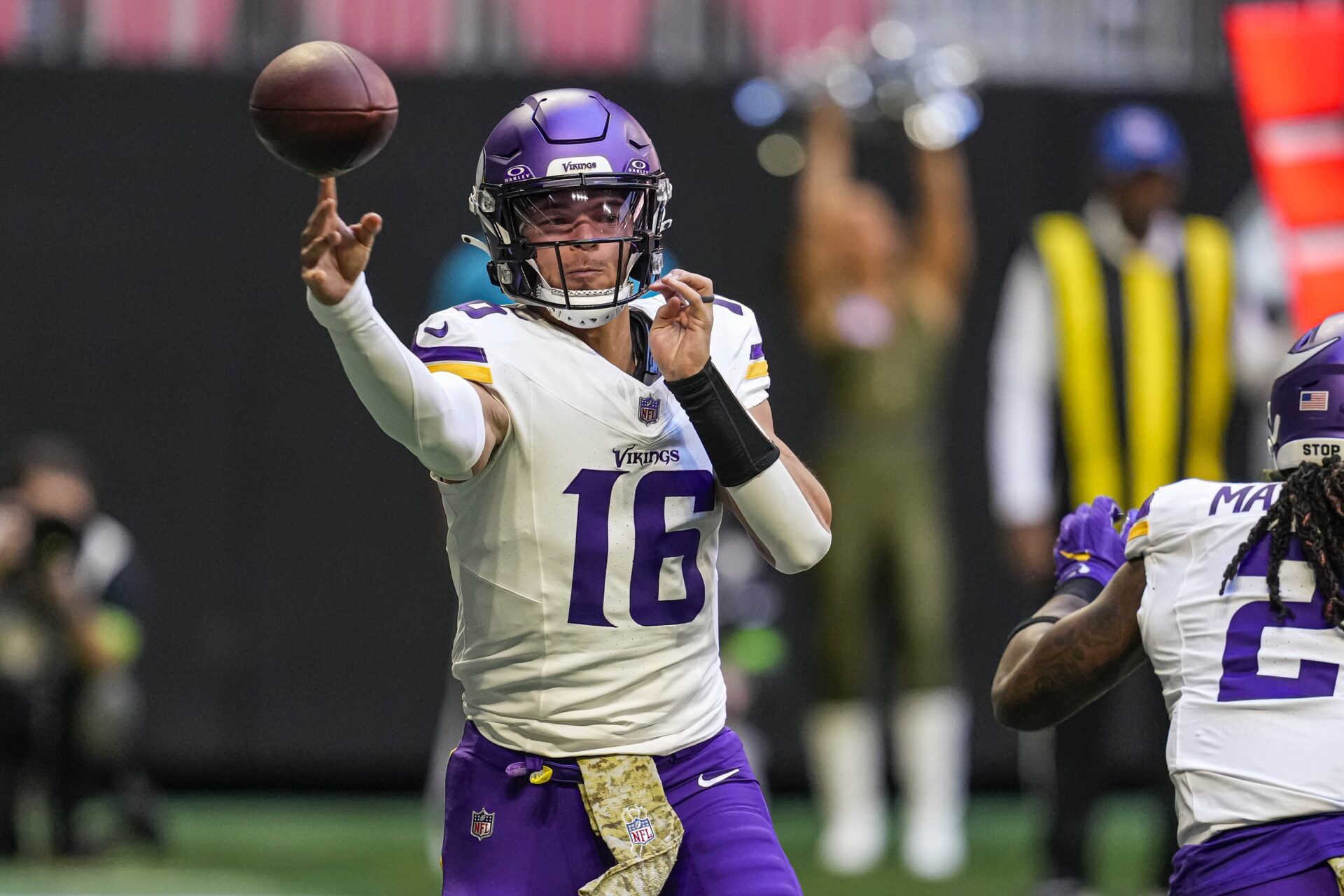 Minnesota Vikings QB Jaren Hall (16) throws a pass against the Atlanta Falcons.