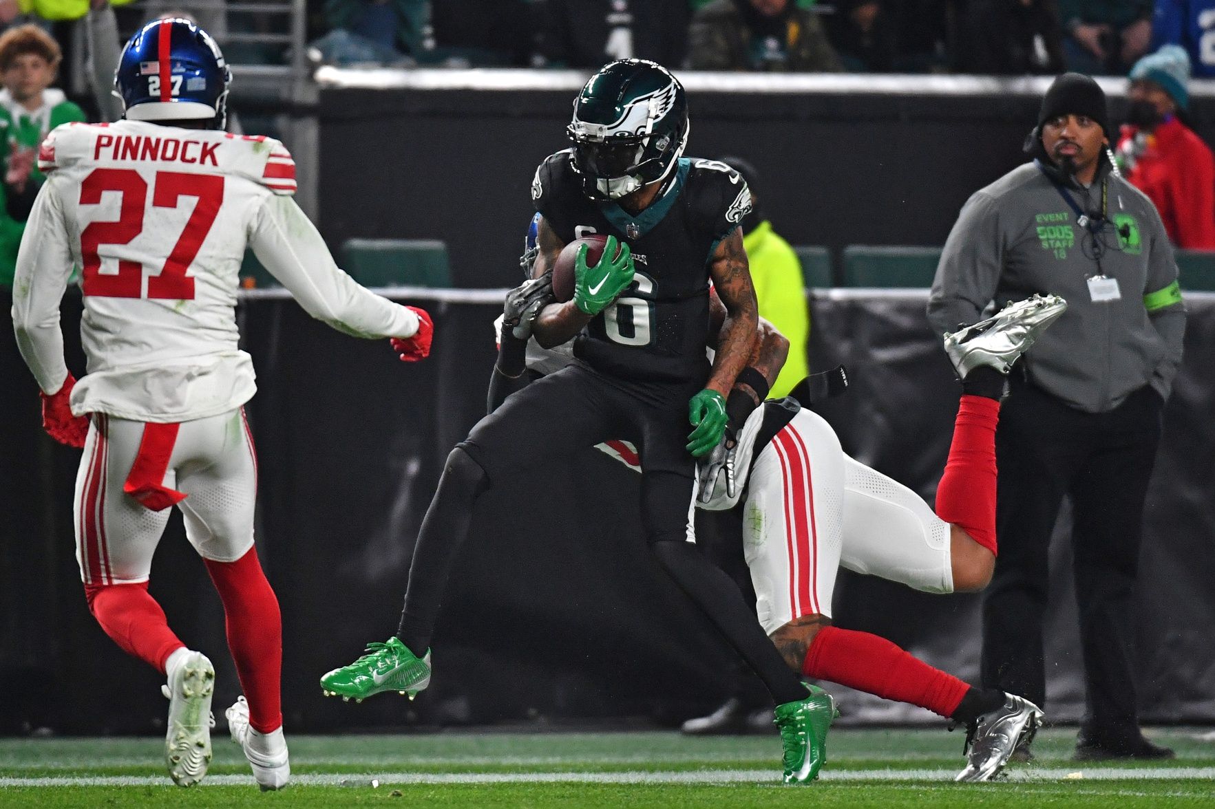 Philadelphia Eagles wide receiver DeVonta Smith (6) is tackled by New York Giants safety Isaiah Simmons (19) during the second quarter at Lincoln Financial Field.