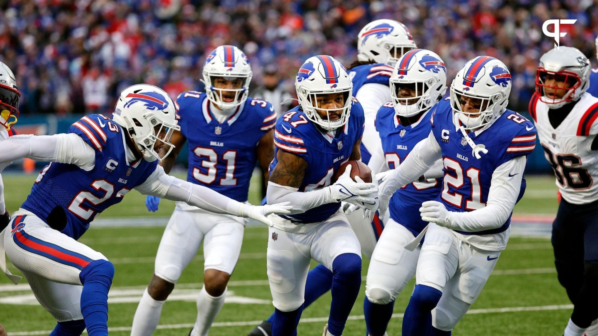 Buffalo Bills cornerback Christian Benford (47) stole the ball from New England Patriots wide receiver Kayshon Boutte (80) for turnover.