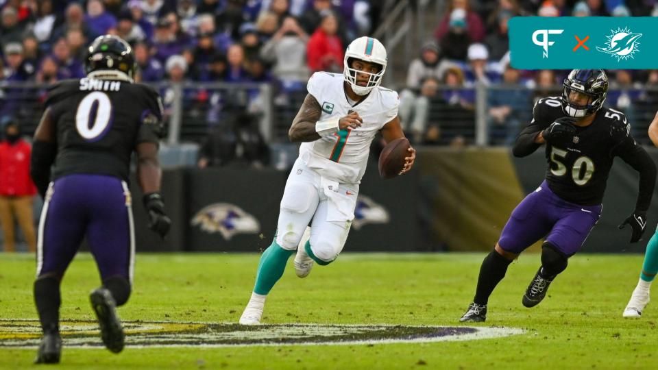 Miami Dolphins quarterback Tua Tagovailoa (1) rushes during the second half against the Baltimore Ravens at M&T Bank Stadium.Baltimore Ravens defeated Miami Dolphins 56-19.