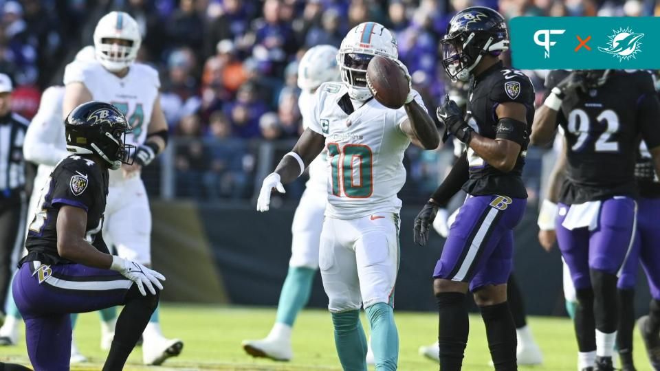 Miami Dolphins wide receiver Tyreek Hill (10) reacts after making a first down against the Baltimore Ravens during the first half at M&T Bank Stadium.