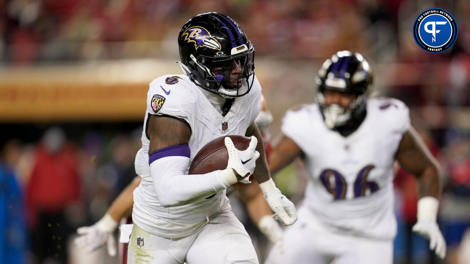 Baltimore Ravens linebacker Patrick Queen (6) runs with the ball after intercepting a pass against the San Francisco 49ers in the third quarter at Levi's Stadium.