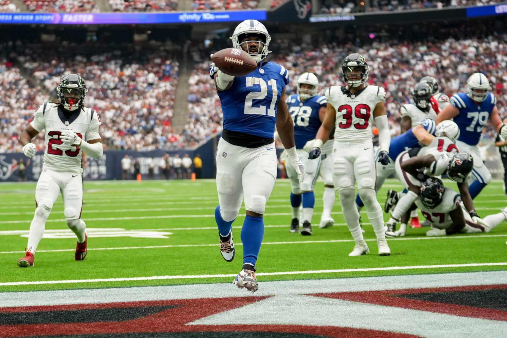 Indianapolis Colts running back Zack Moss (21) runs in a touchdown Sunday, Sept. 17, 2023, during a game against the Houston Texans at NRG Stadium in Houston.