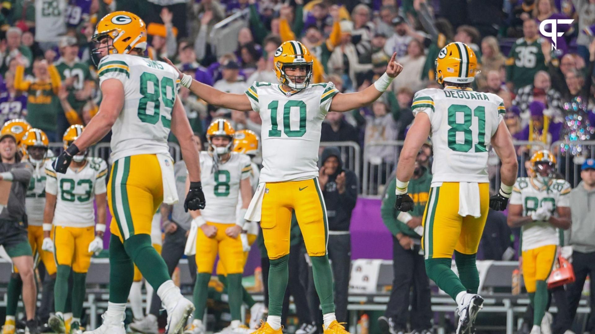 Green Bay Packers quarterback Jordan Love (10) celebrates his touchdown against the Minnesota Vikings in the second quarter at U.S. Bank Stadium.