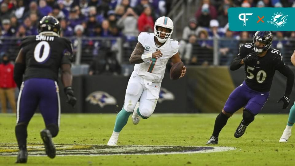 Miami Dolphins QB Tua Tagovailoa (1) runs with the ball against the Baltimore Ravens.