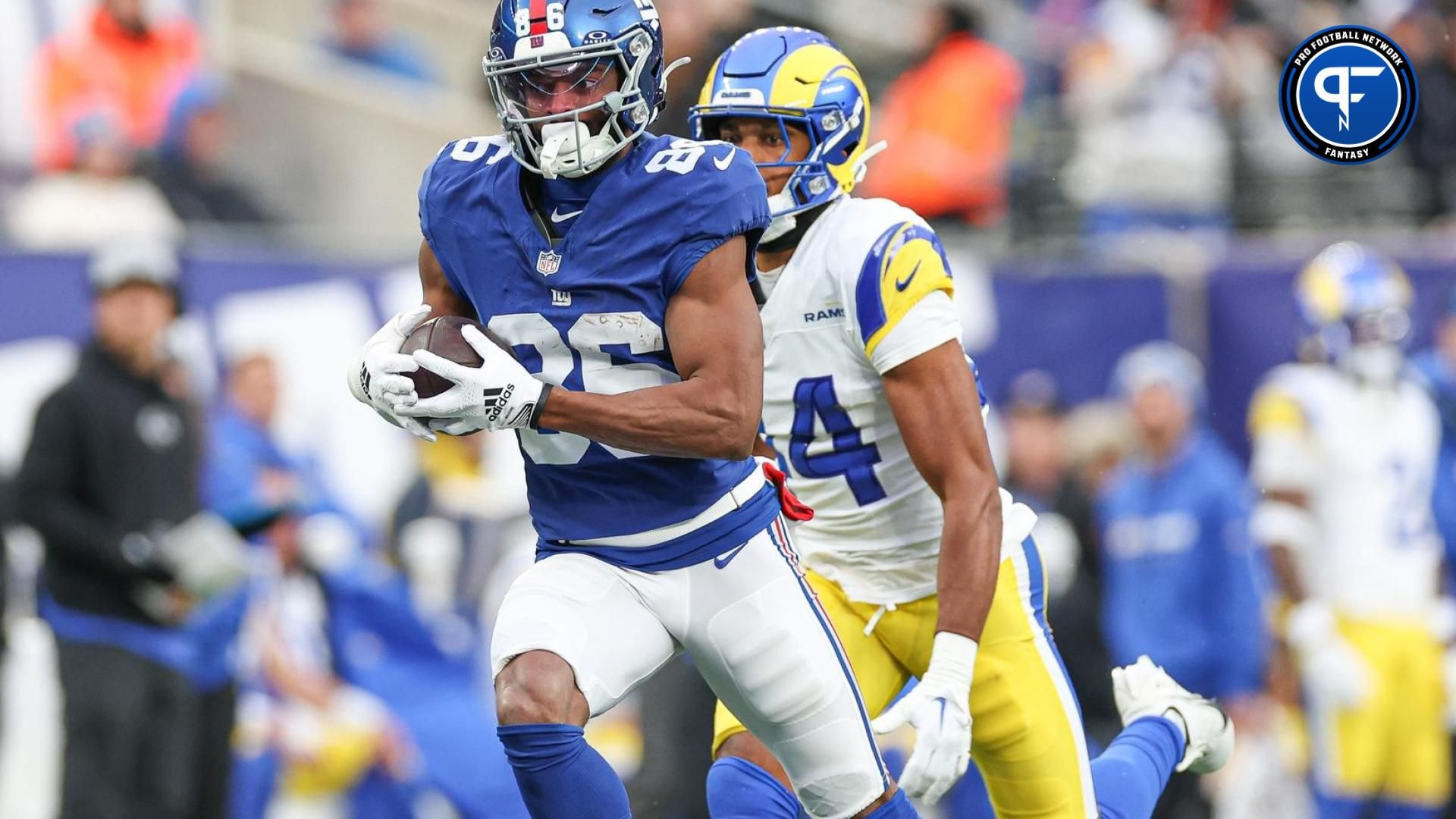 New York Giants WR Darius Slayton (86) runs the ball into the end zone against the Los Angeles Rams.