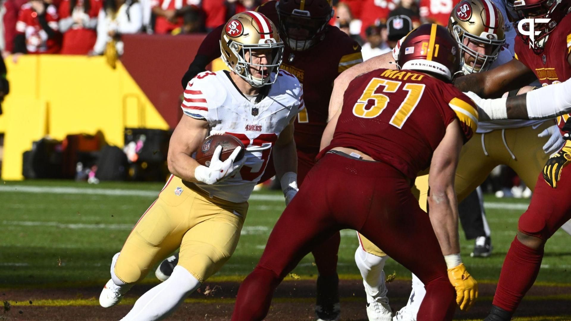 San Francisco 49ers running back Christian McCaffrey (23) carries the ball against the Washington Commanders during the first half at FedExField.