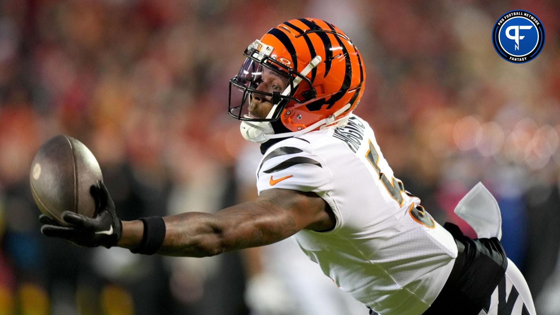 Cincinnati Bengals wide receiver Tee Higgins (5) gets his hand on a deep pass in the third quarter during a Week 17 NFL football game between the Cincinnati Bengals and the Kansas City Chiefs at GEHA Field at Arrowhead Stadium.