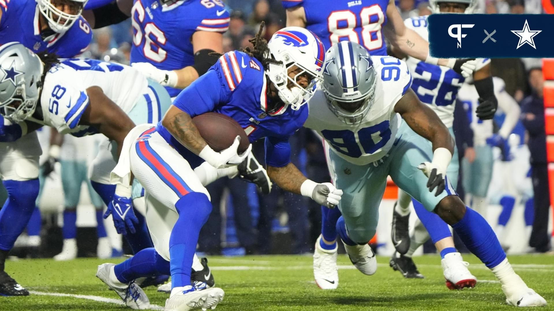 Buffalo Bills running back James Cook (4) is tackled by Dallas Cowboys defensive end DeMarcus Lawrence (90) in the first half at Highmark Stadium.