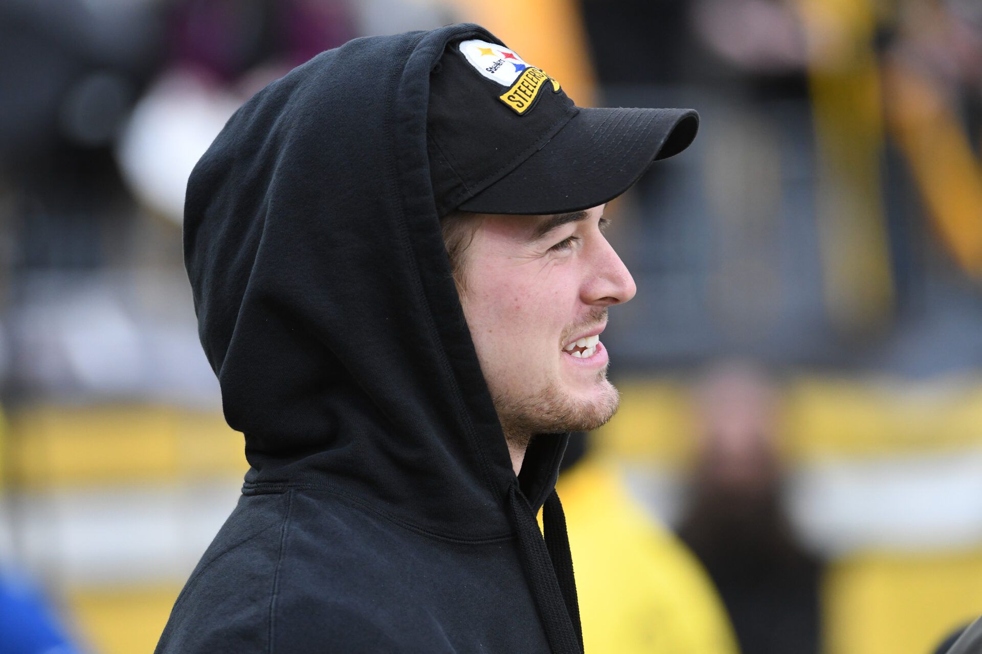 Pittsburgh Steelers quarterback Kenny Pickett (8) watches from the sidelines before a game against the Cincinnati Bengals at Acrisure Stadium.