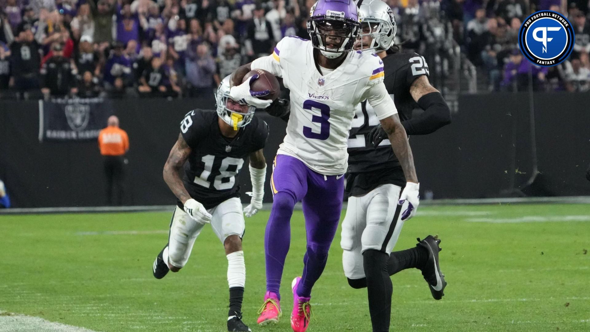 Minnesota Vikings WR Jordan Addison (3) runs with the ball against the Las Vegas Raiders.