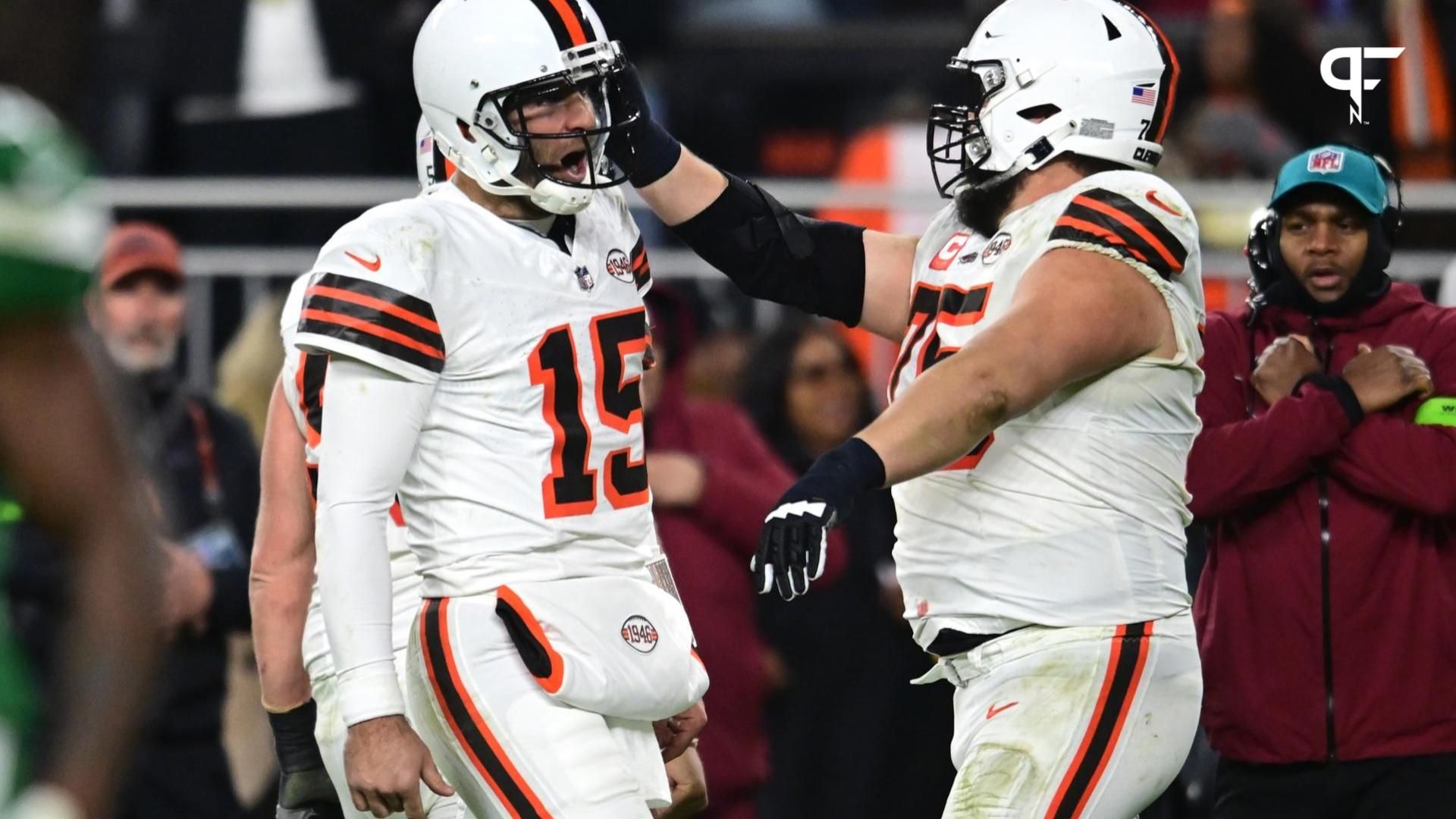 Cleveland Browns quarterback Joe Flacco (15) celebrates with guard Joel Bitonio (75) after a touchdown pass against the New York Jets during the first half at Cleveland Browns Stadium.