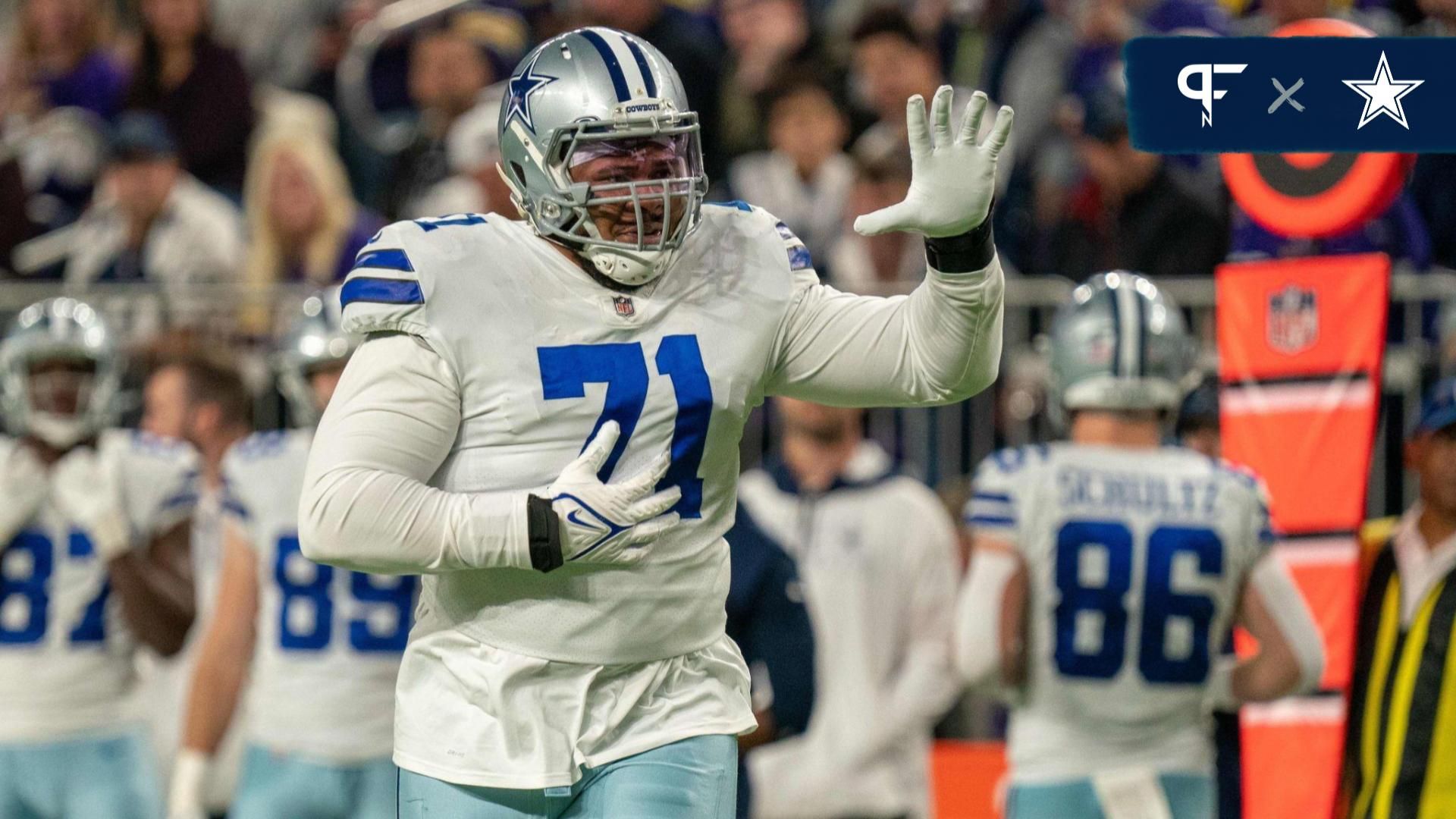 Dallas Cowboys offensive tackle La'el Collins (71) indicates he is an eligible receiver entering the game in the third quarter against the Minnesota Vikings at U.S. Bank Stadium.