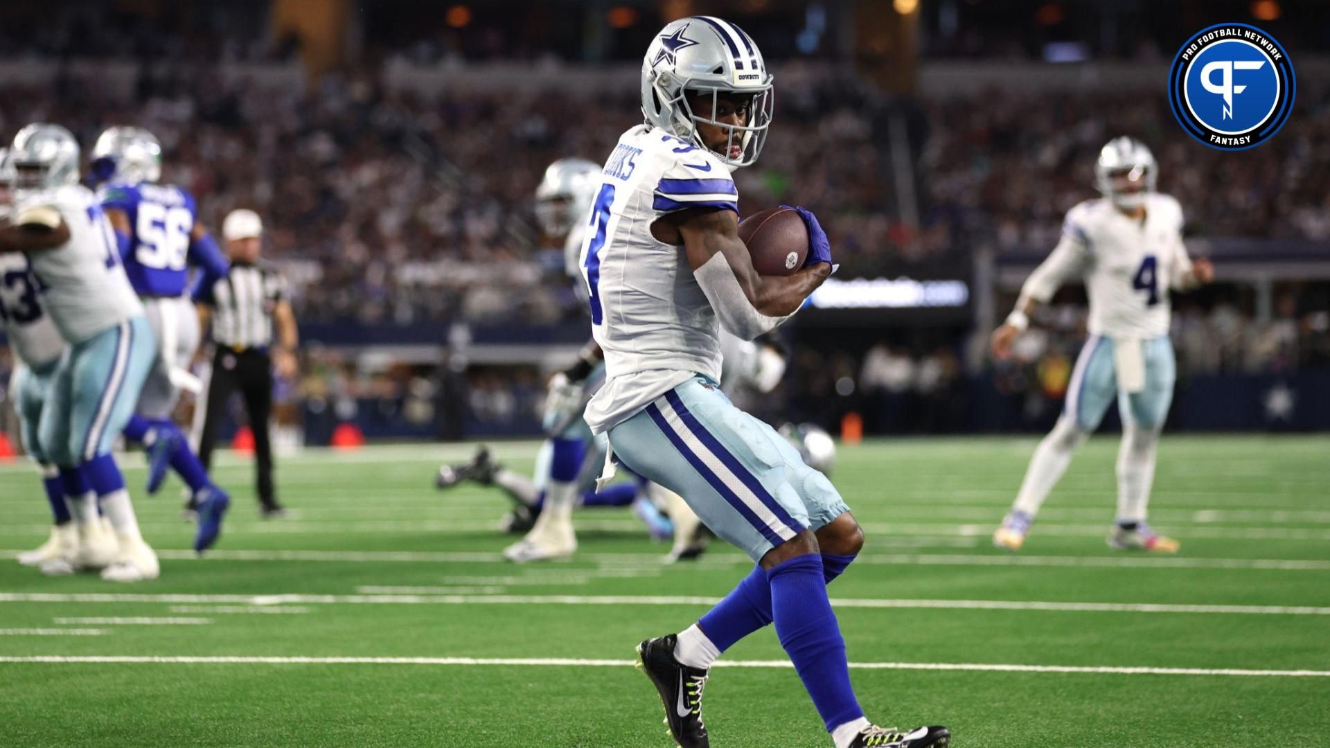 Dallas Cowboys wide receiver Brandin Cooks (3) scores a touchdown against the Seattle Seahawks during the first half at AT&T Stadium.