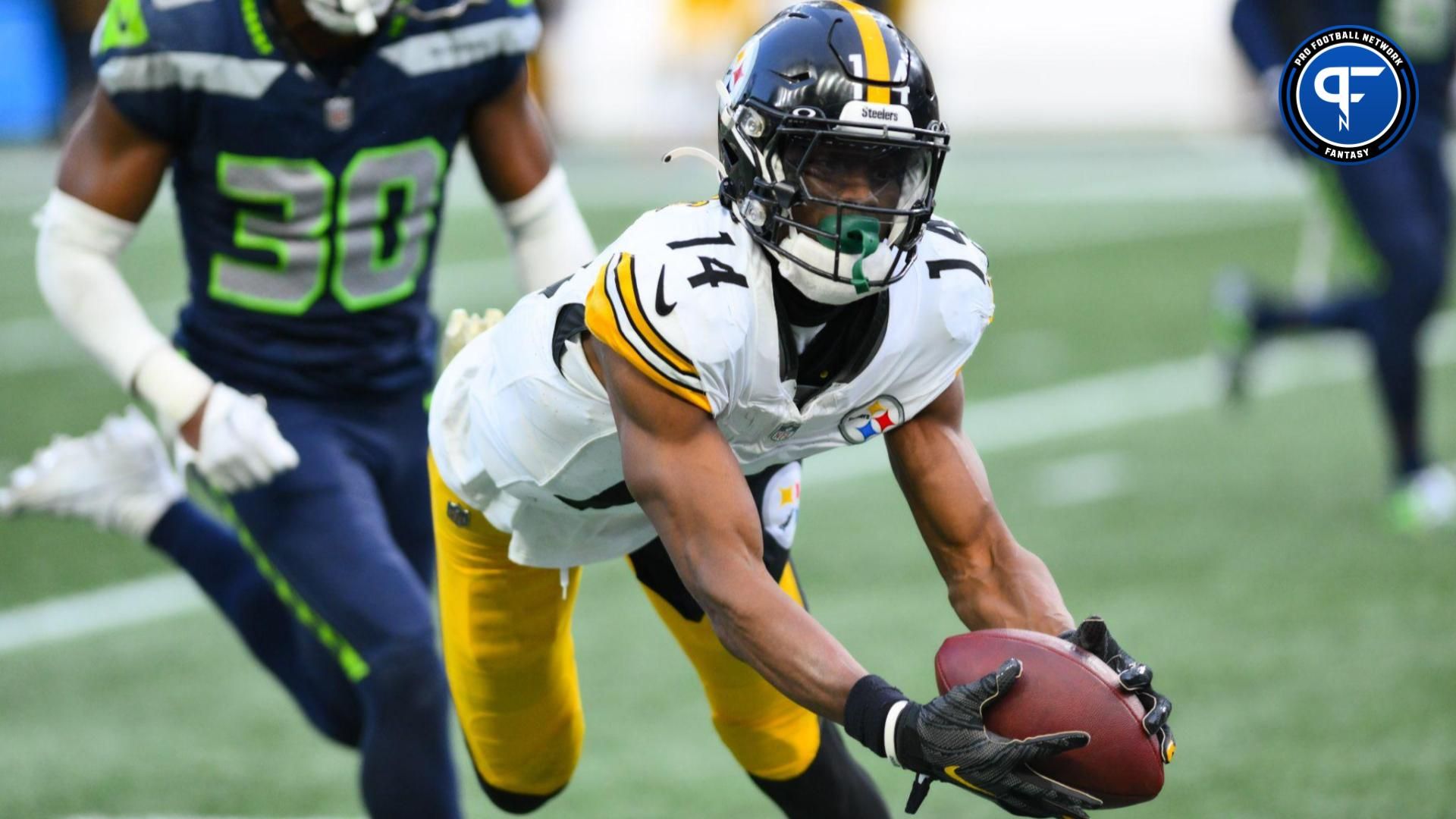 Pittsburgh Steelers wide receiver George Pickens (14) catches a pass against the Seattle Seahawks during the second half at Lumen Field.