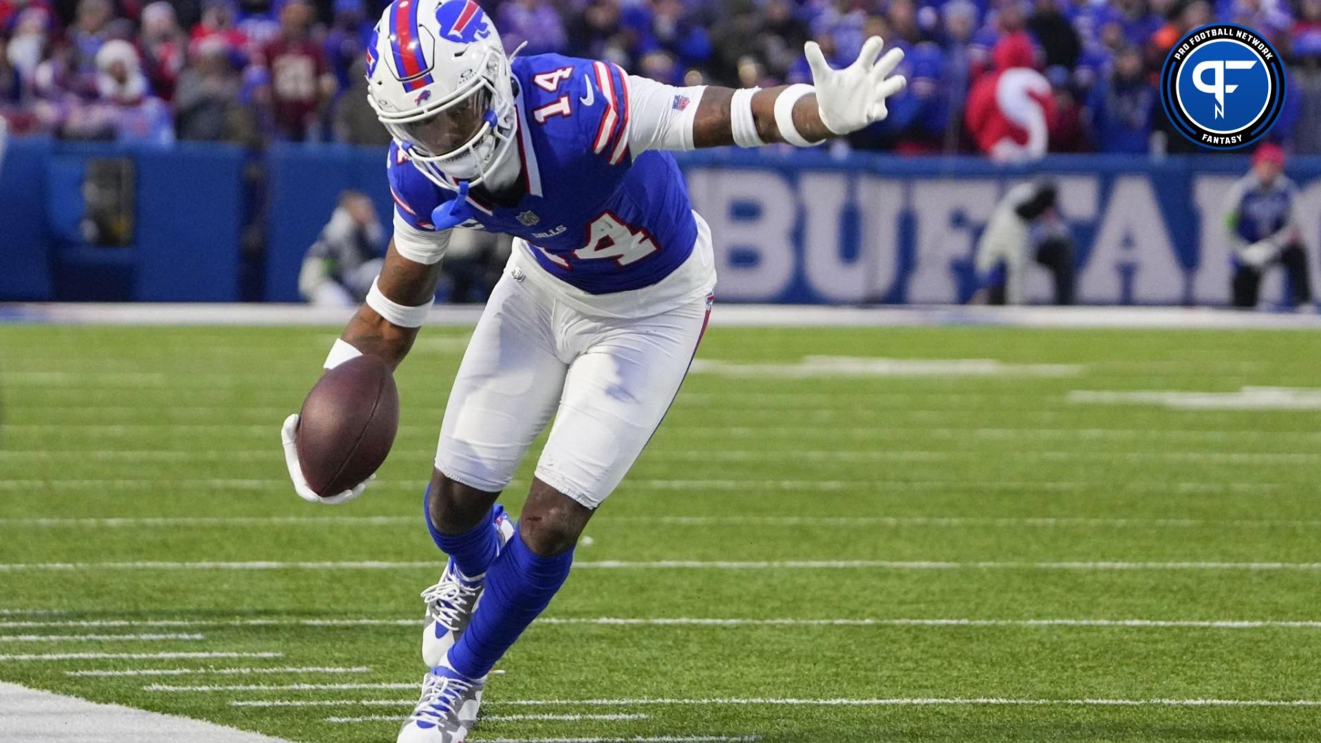 Buffalo Bills wide receiver Stefon Diggs (14) runs with the ball along the sidelines after making a catch against the New England Patriots during the second half at Highmark Stadium.