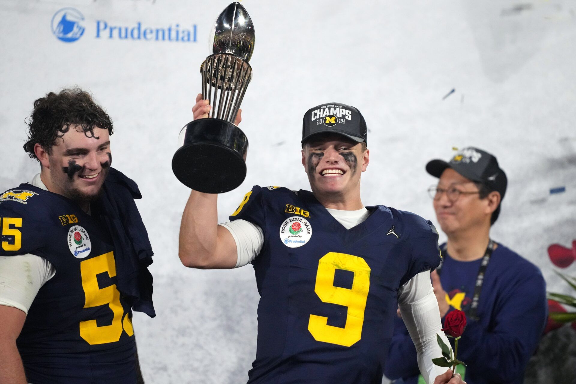 Michigan Wolverines quarterback J.J. McCarthy (9) celebrates with the Leishman Trophy after defeating the Alabama Crimson Tide in the 2024 Rose Bowl college football playoff semifinal game at Rose Bowl.