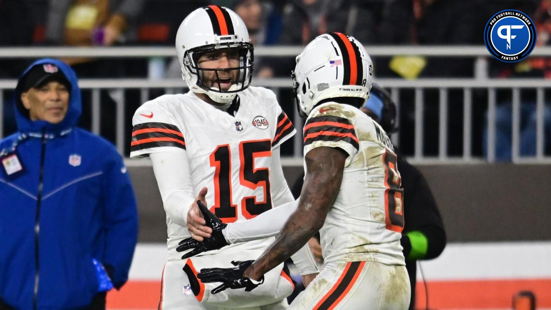 Cleveland Browns quarterback Joe Flacco (15) and wide receiver Elijah Moore (8) celebrate after a touchdown against the New York Jets during the first half at Cleveland Browns Stadium.