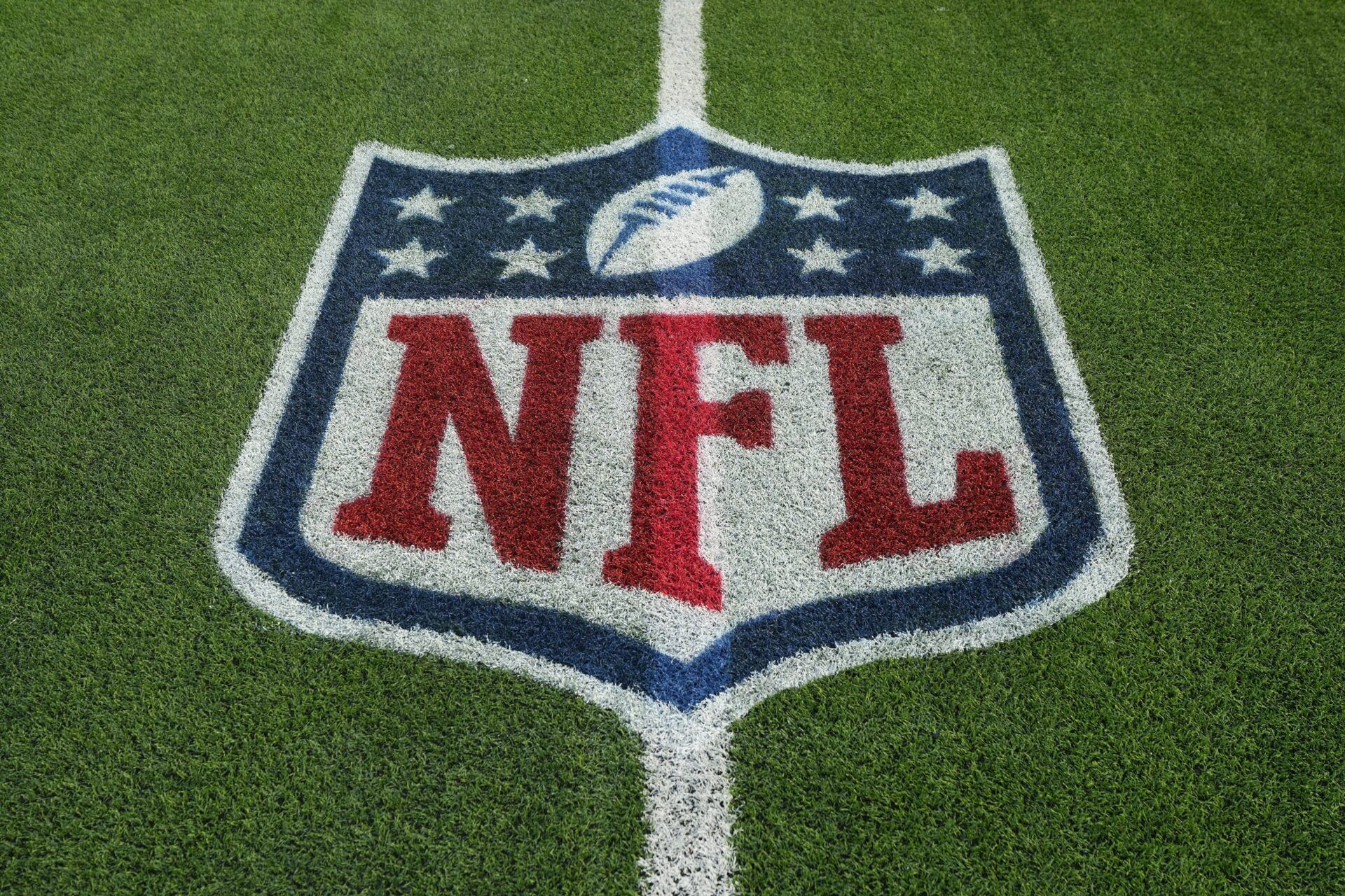 The NFL shield logo on the field at SoFi Stadium.