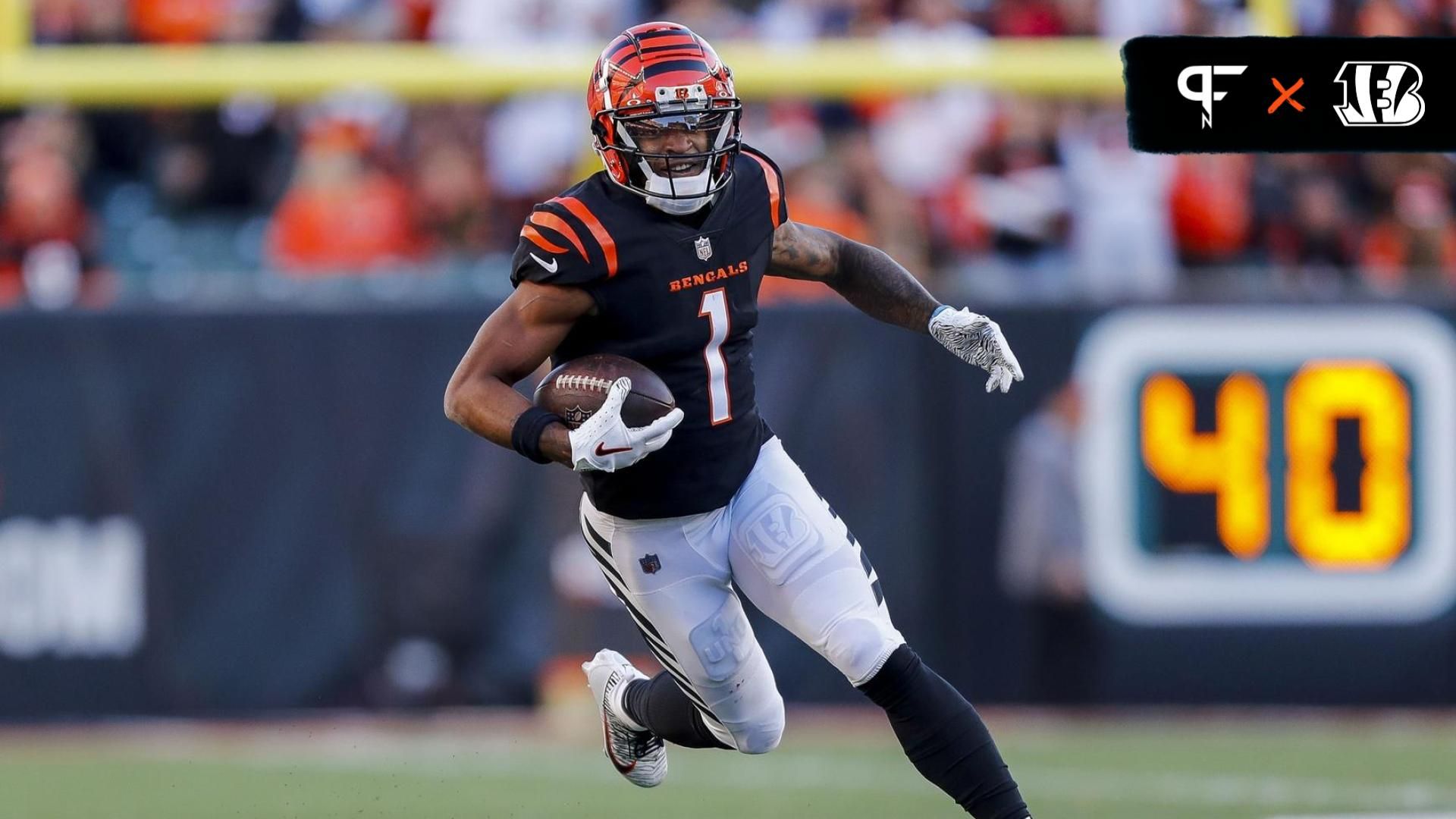 Cincinnati Bengals wide receiver Ja'Marr Chase (1) runs with the ball against the Houston Texans in the second half at Paycor Stadium.