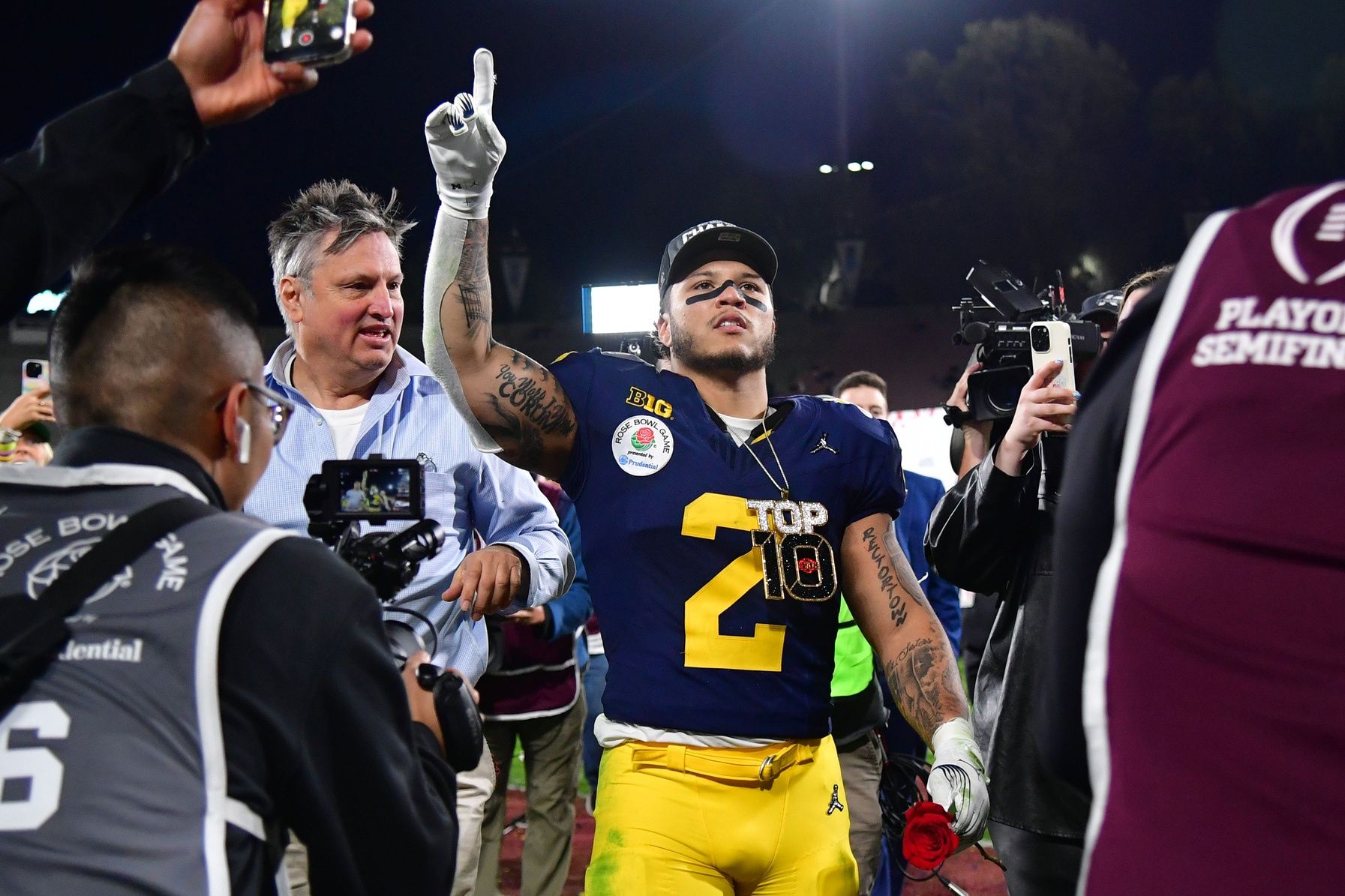 Michigan Wolverines running back Blake Corum (2) celebrates after defeating the Alabama Crimson Tide in the 2024 Rose Bowl college football playoff semifinal game at Rose Bowl.