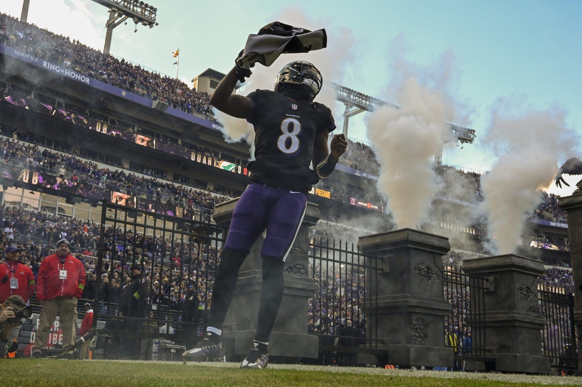 Baltimore Ravens quarterback Lamar Jackson (8) enters the field before the game against the Miami Dolphins at M&T Bank Stadium.