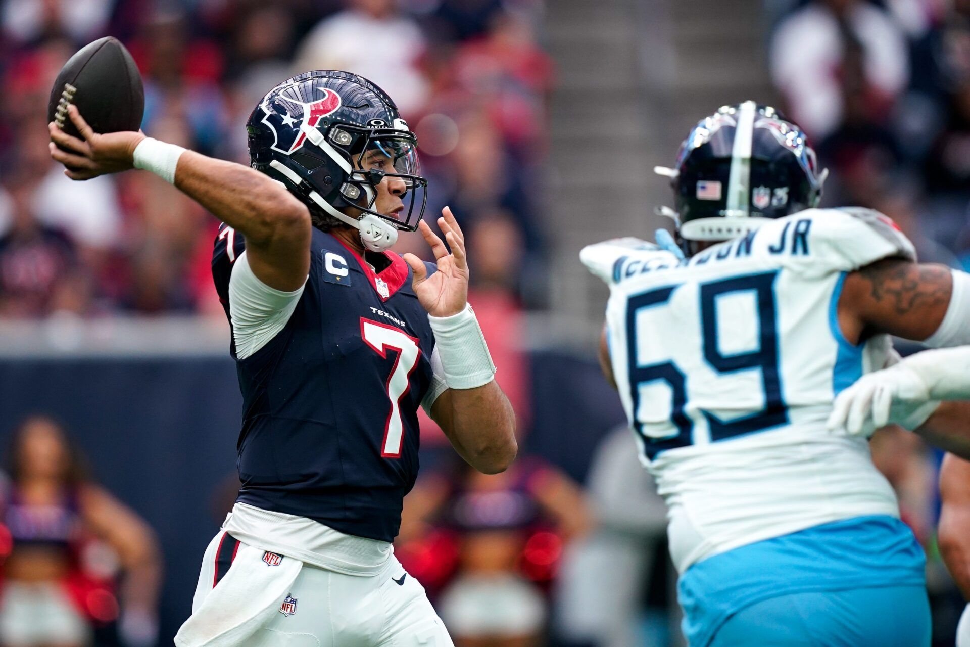 Houston Texans quarterback C.J. Stroud (7) throws the ball against the Tennessee Titans during the second quarter at NRG Stadium.