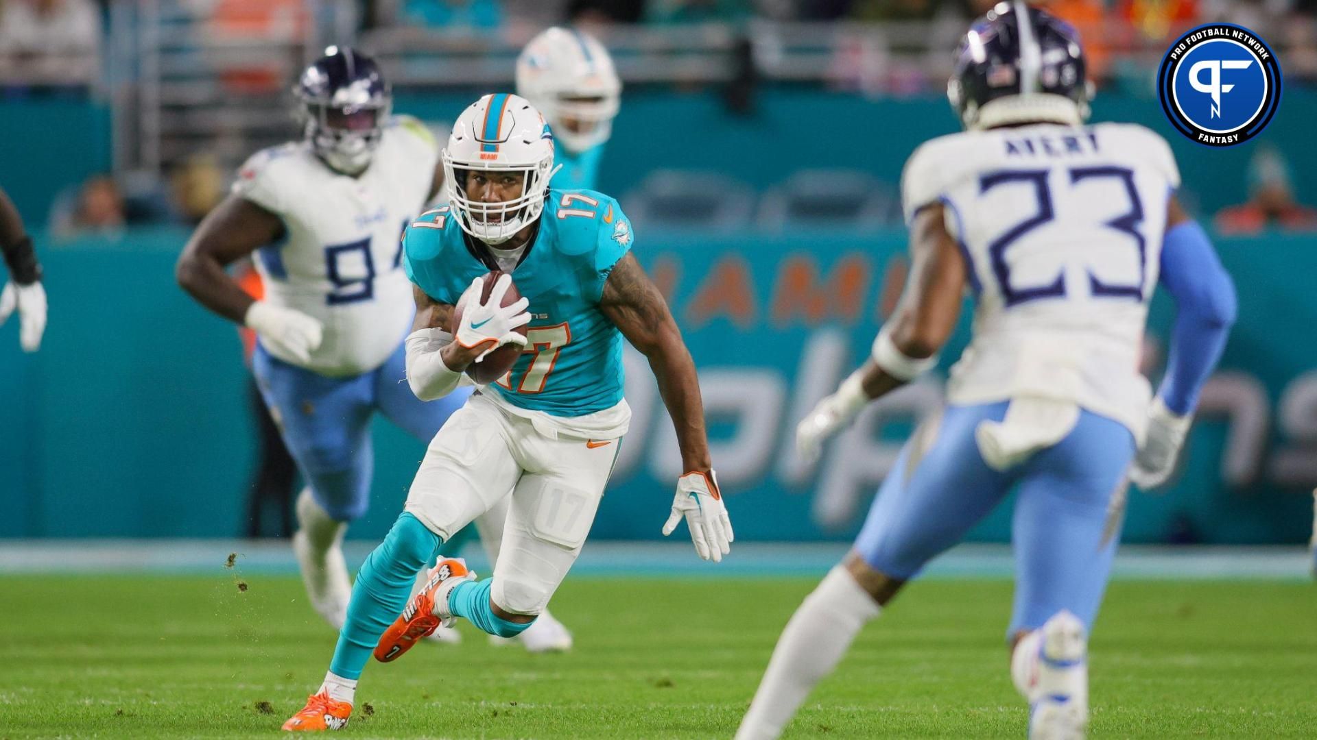 Miami Dolphins wide receiver Jaylen Waddle (17) runs with the football against the Tennessee Titans during the first quarter at Hard Rock Stadium.