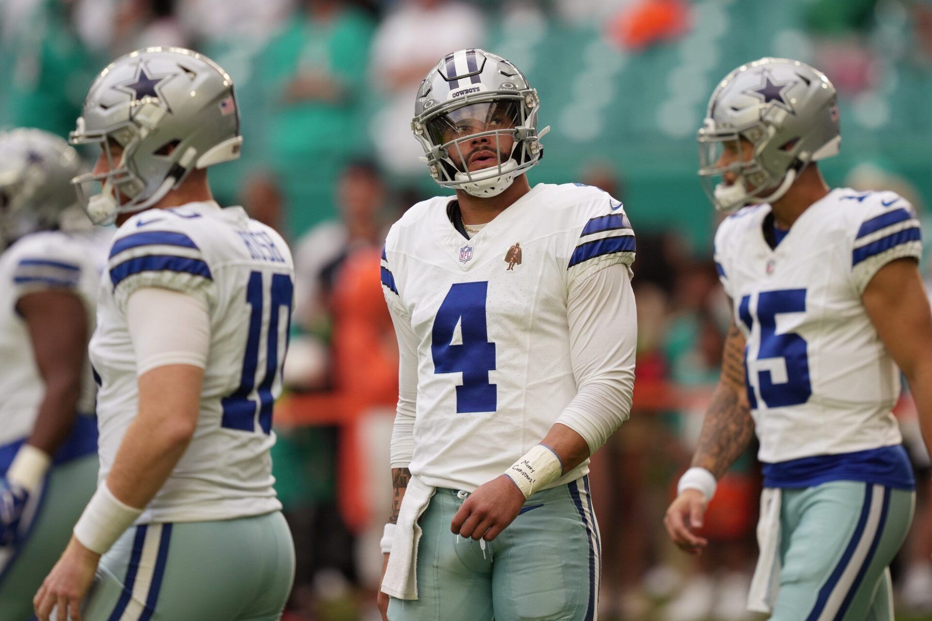 Dallas Cowboys quarterback Dak Prescott (4) warms-up before the NFL game against the Miami Dolphins at Hard Rock Stadium.