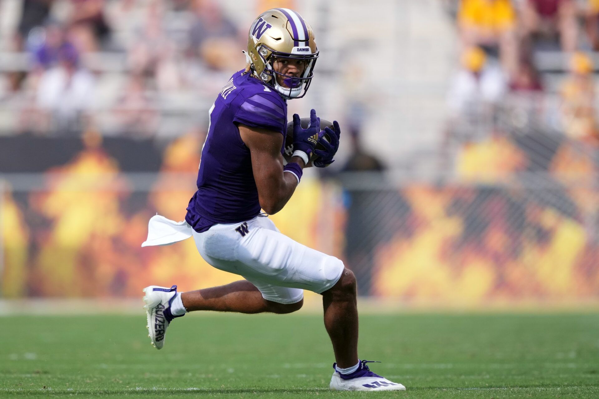 Washington Huskies wide receiver Rome Odunze (1) makes a catch against the Arizona State Sun Devils during the second half at Sun Devil Stadium.