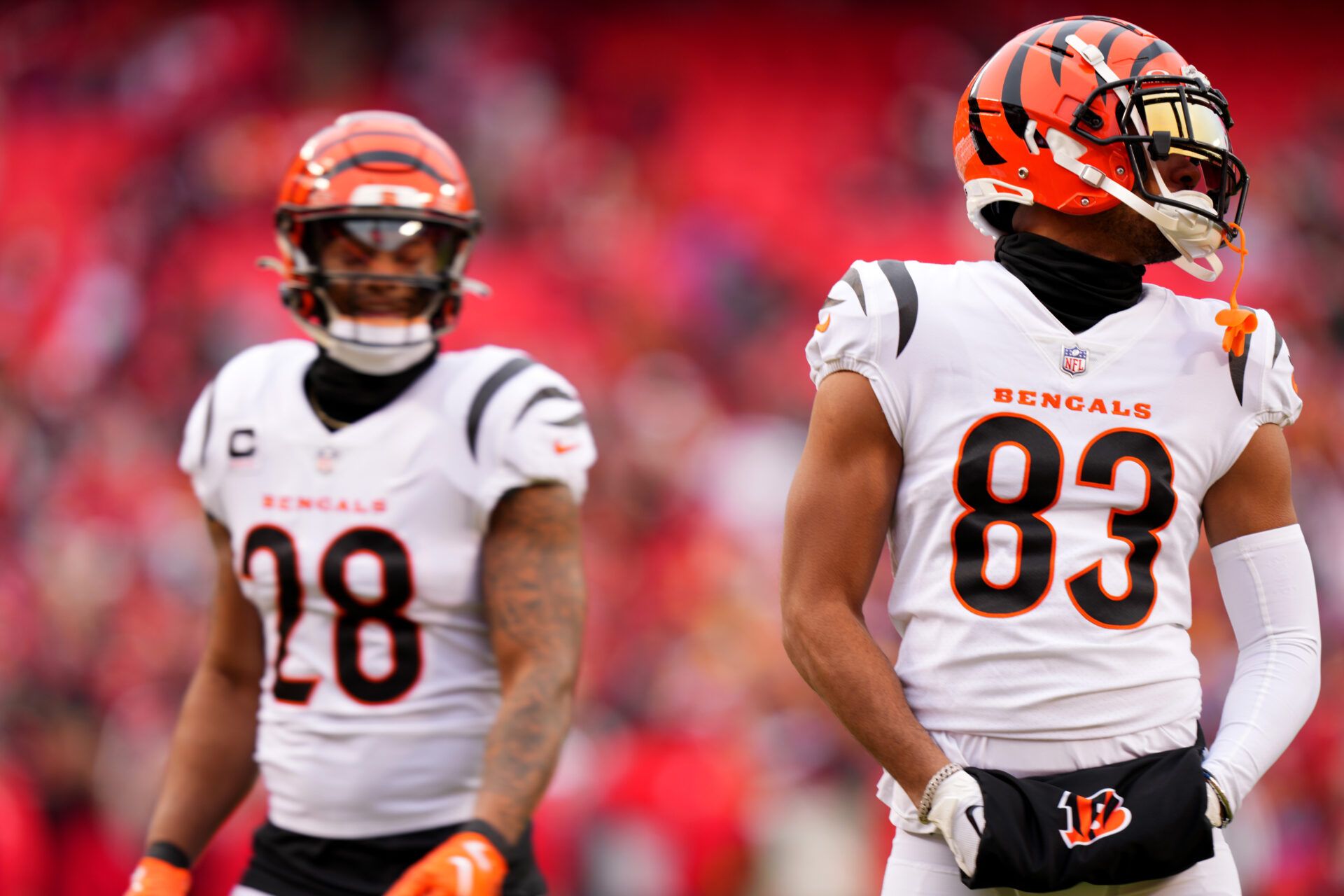 Cincinnati Bengals running back Joe Mixon (28) and wide receiver Tyler Boyd (83) warm up prior to the game against the Kansas City Chiefs,at GEHA Field